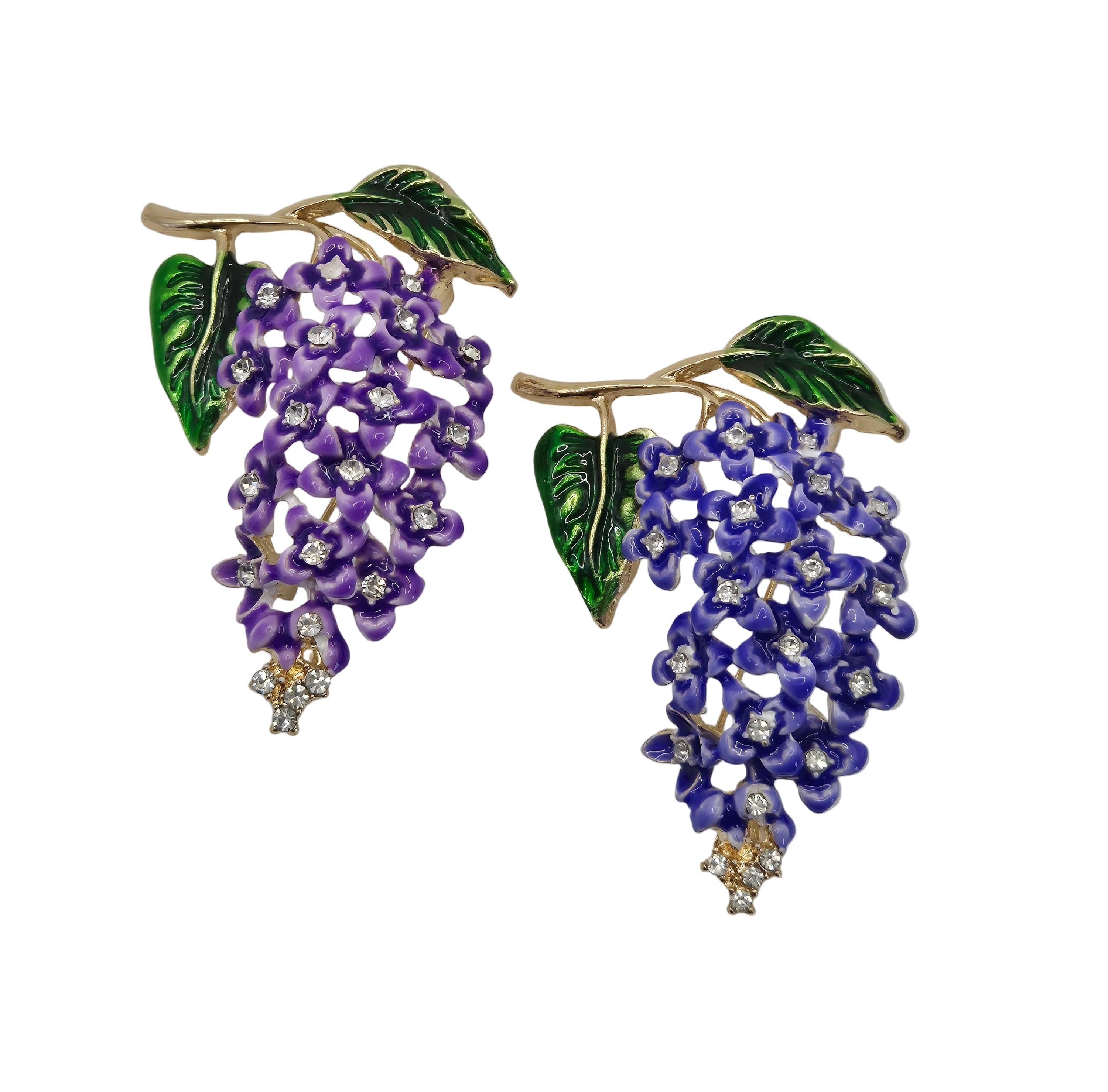 purple and blue wisteria floral brooch with rhinestone detailing on a white background