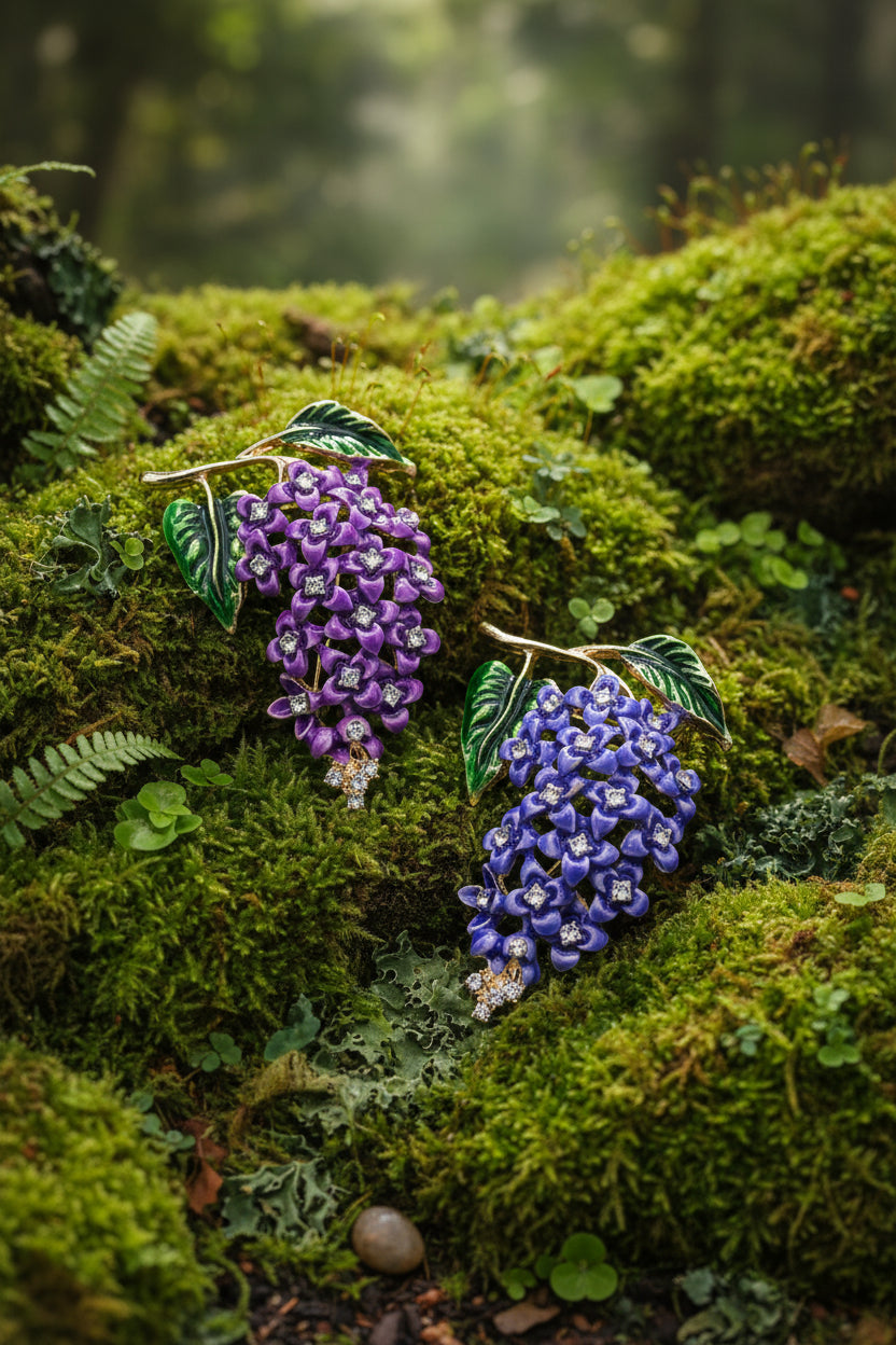 purple and blue wisteria brooch on moss background