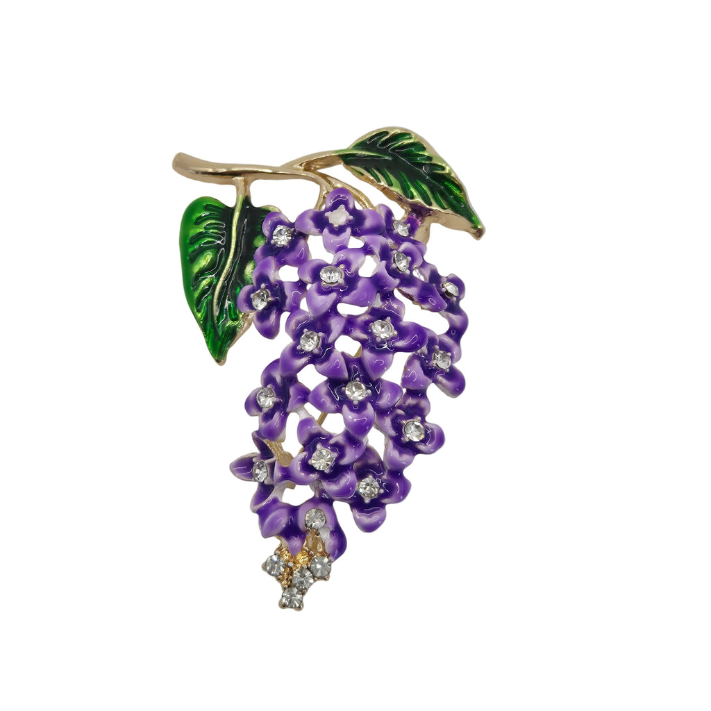purple wisteria floral brooch with rhinestone detailing on a white background