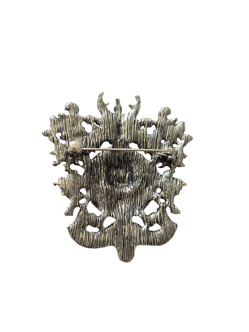 silver metal lion head brooch