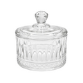 Clear glass lidded jar with a faceted knob top and vertical ribbed detailing, shown on a white background.