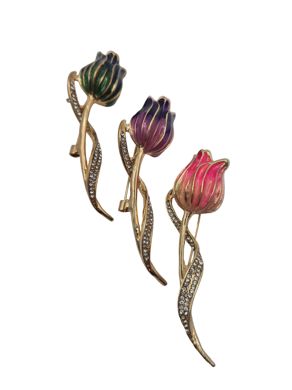 Three tulip-shaped brooches with gold and gemstone accents on a white background