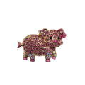 Rhinestone pig brooch with pink gemstones on a white background