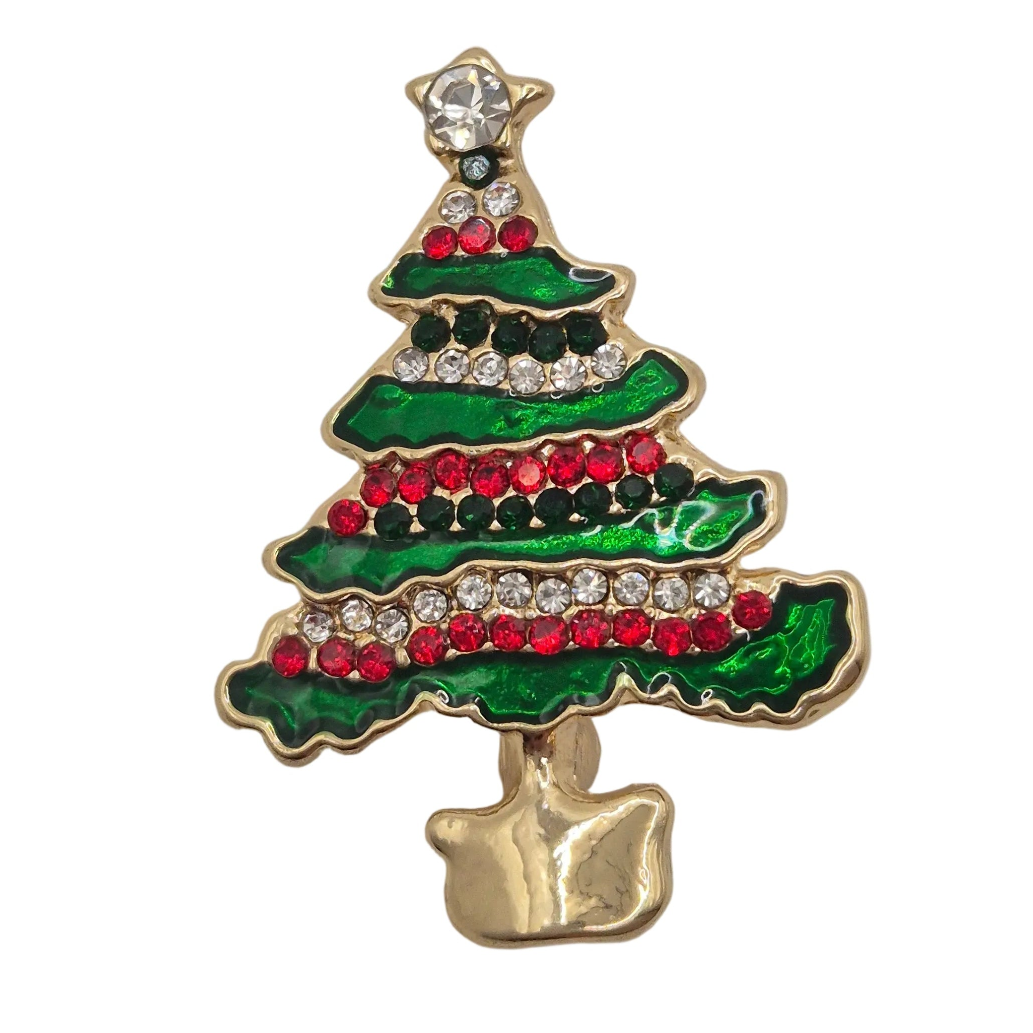 A gold Christmas tree brooch decorated with green enamel, rows of red and black rhinestones, and a clear crystal star on top, set against a plain white background.