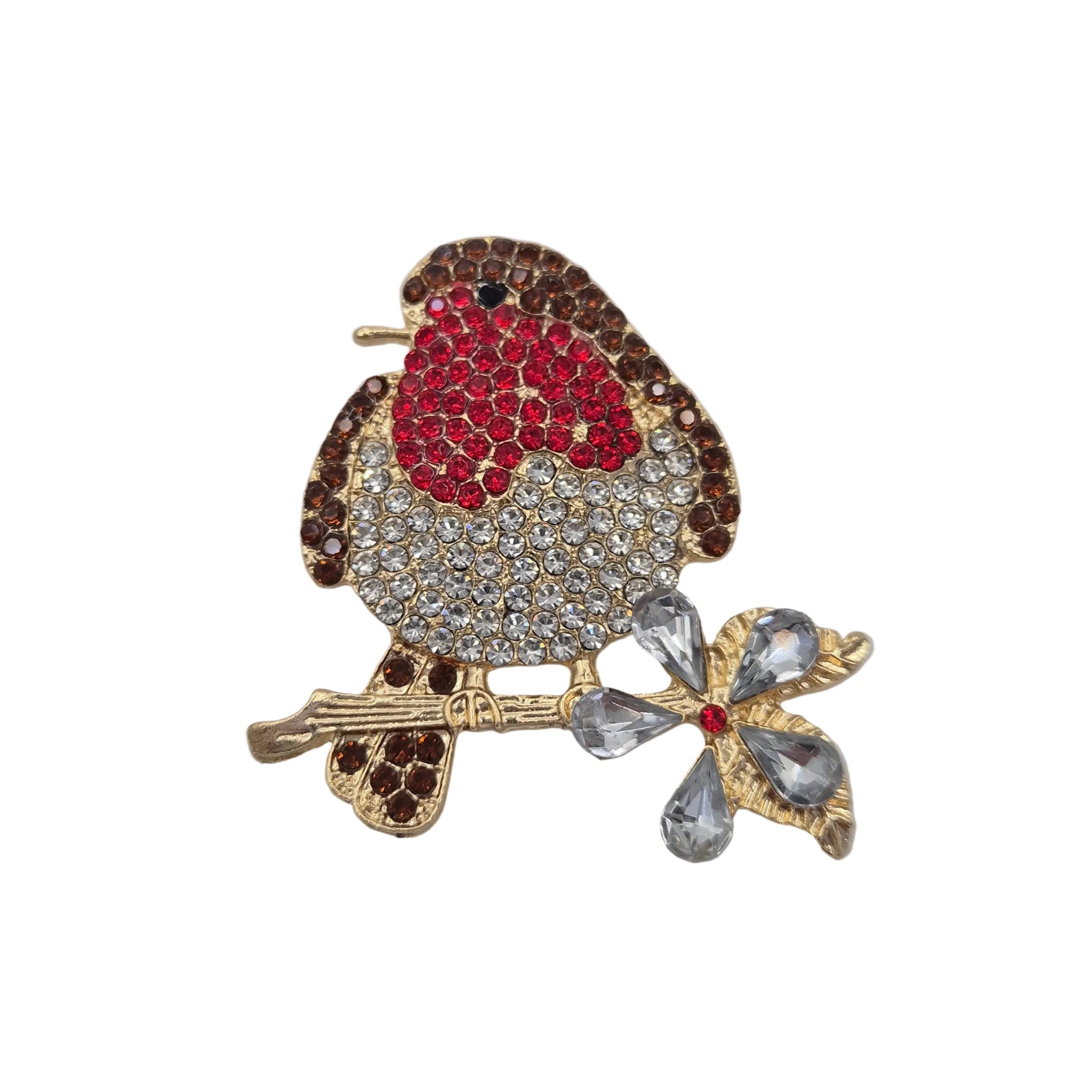 A robin bird brooch embellished with red, clear, and brown rhinestones, perched on a gold branch with a clear crystal flower. Displayed on a plain white background.