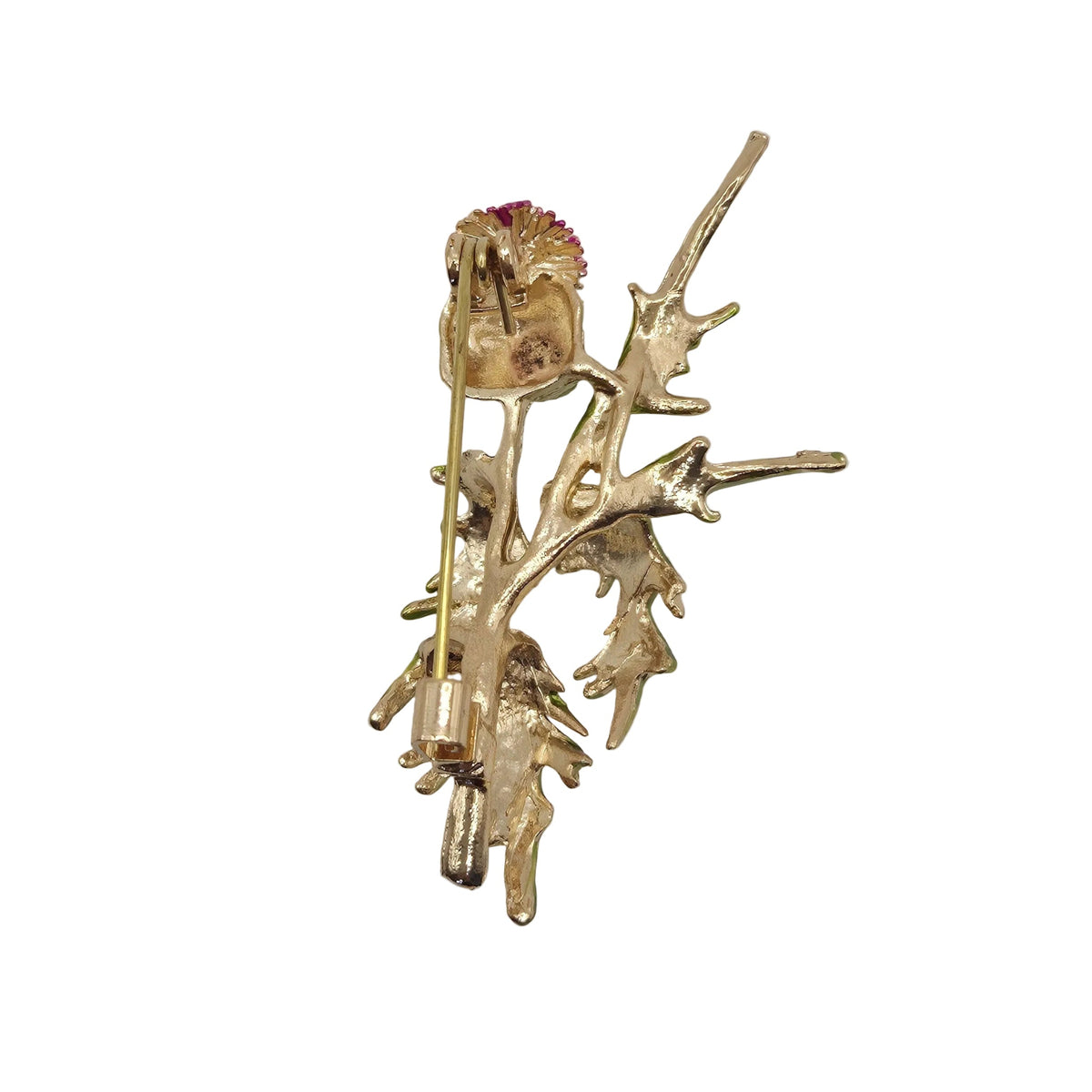 A vintage gold-tone thistle brooch showing the reverse side with the pin mechanism. Photographed against a plain white background.