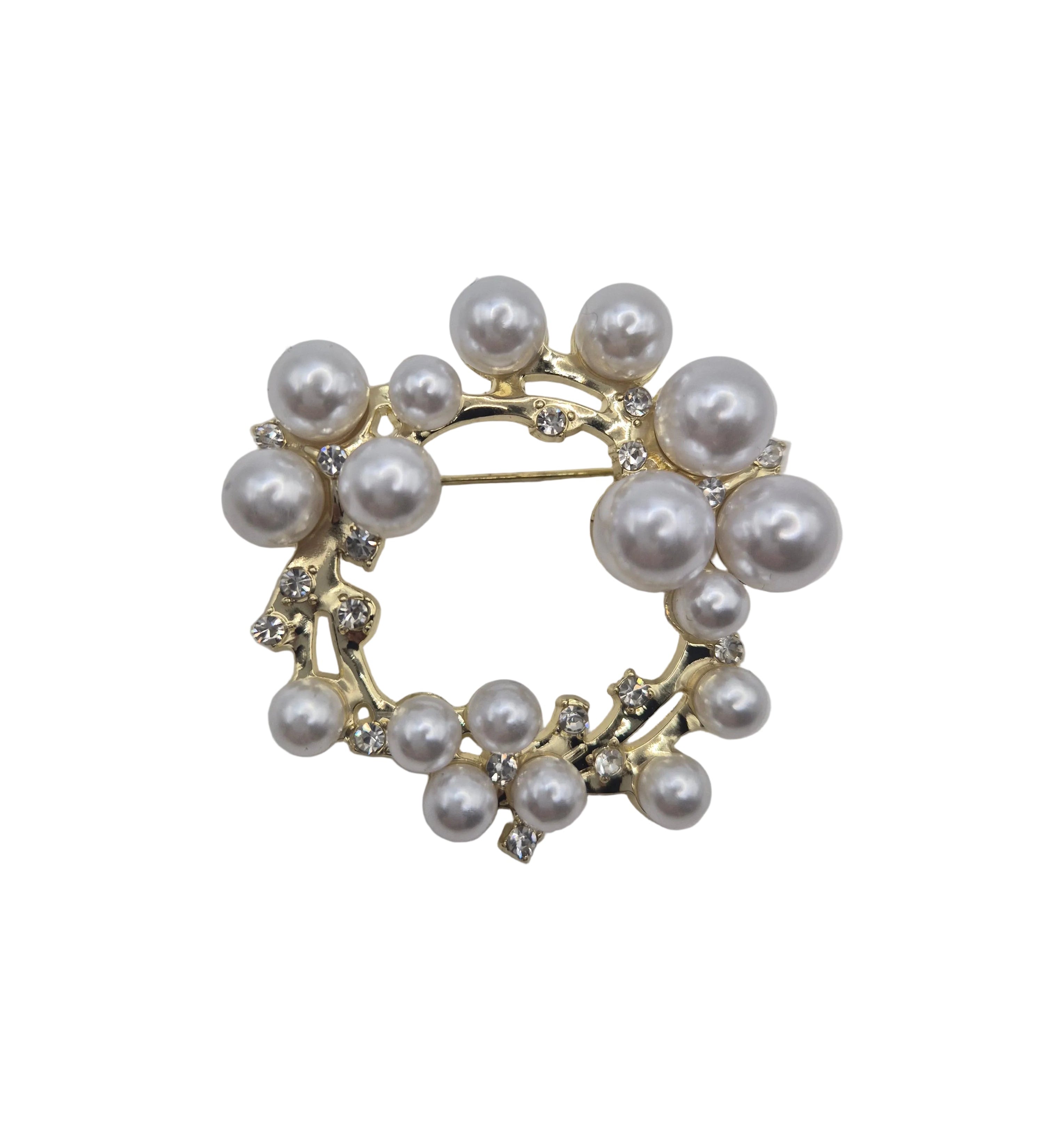 Pearl wreath brooch on a light gray background