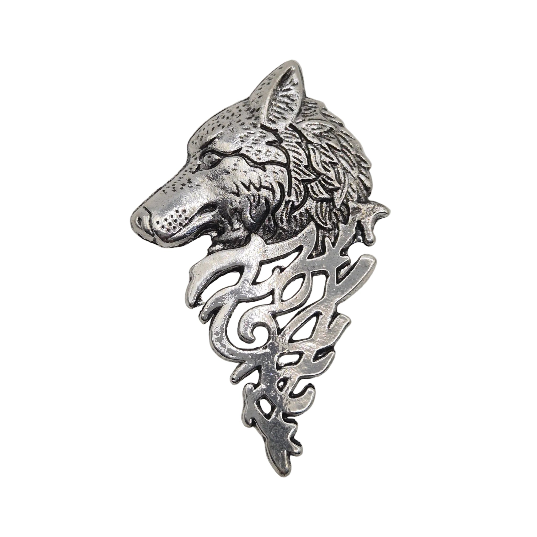 A silver-toned metal brooch featuring a detailed wolf head in profile with ornate scrollwork below, shown on a plain white background.