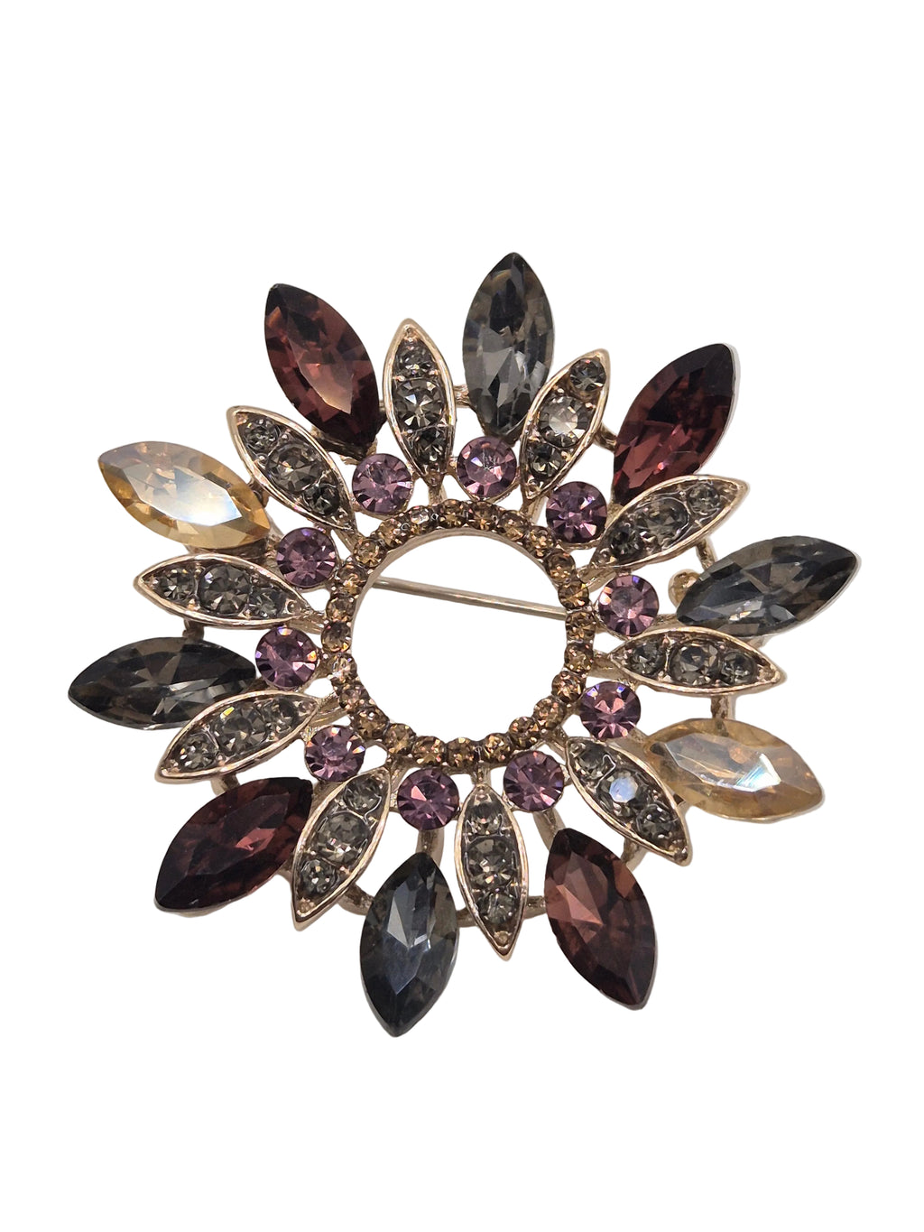 Decorative wreath brooch with multicolored gemstones on a white background
