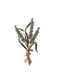 "Large floral brooch with lavender flowers and green leaves on a white background"