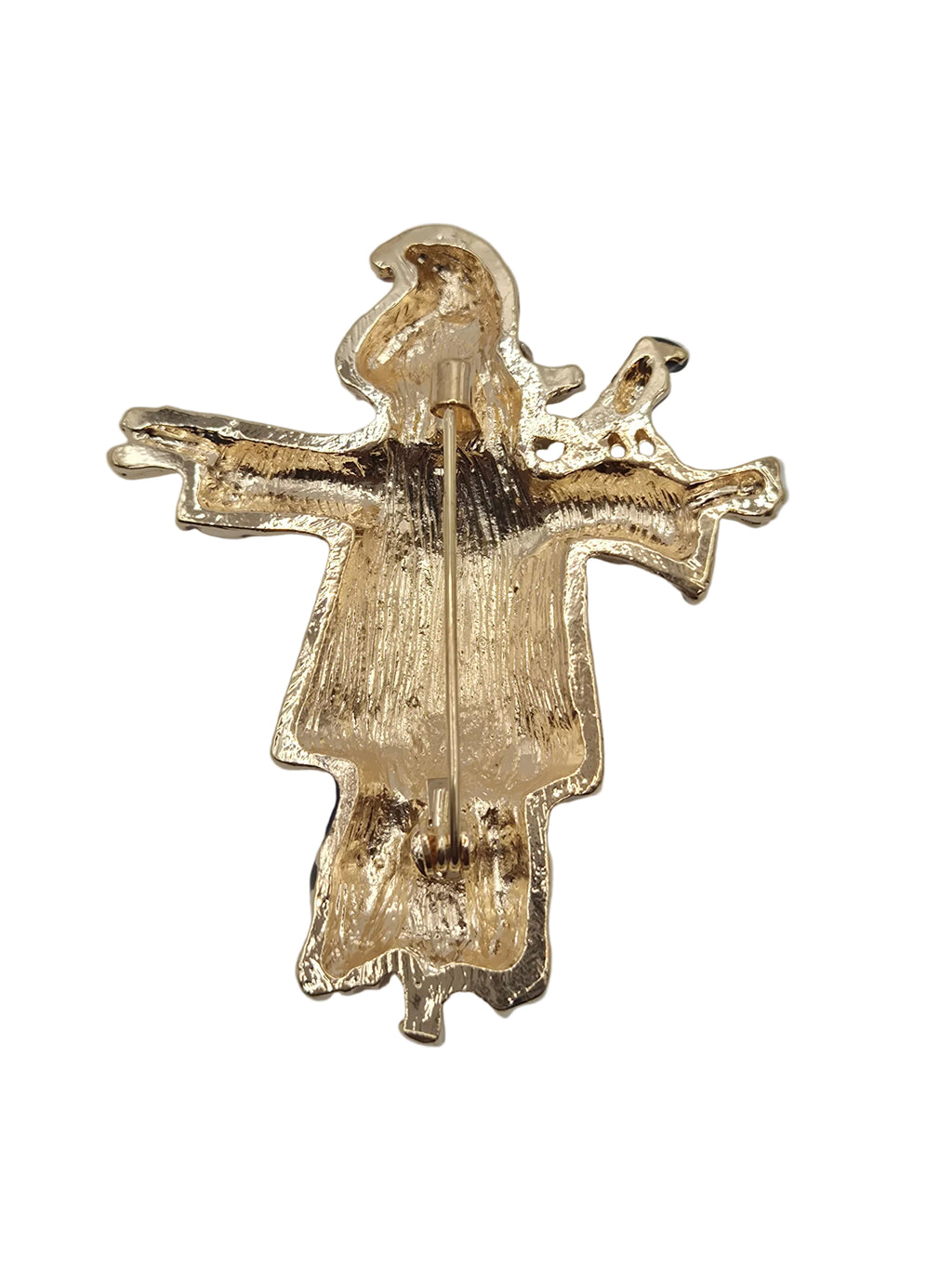 scarecrow brooch on a gray background