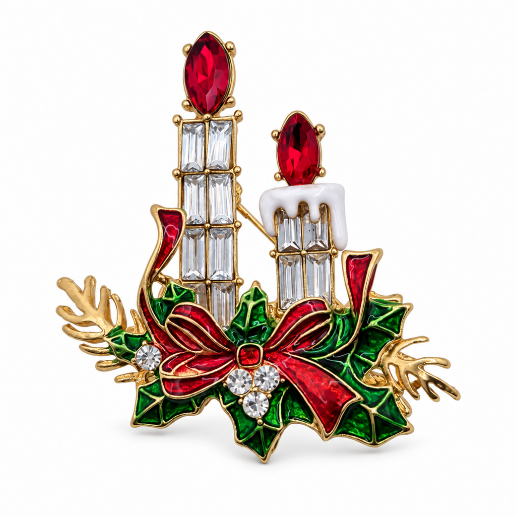A festive Christmas-themed brooch featuring two gold candleposts with red gemstone tops, white wax details, green and red holly leaves, a red bow, and small clear crystal accents, set against a plain white background.