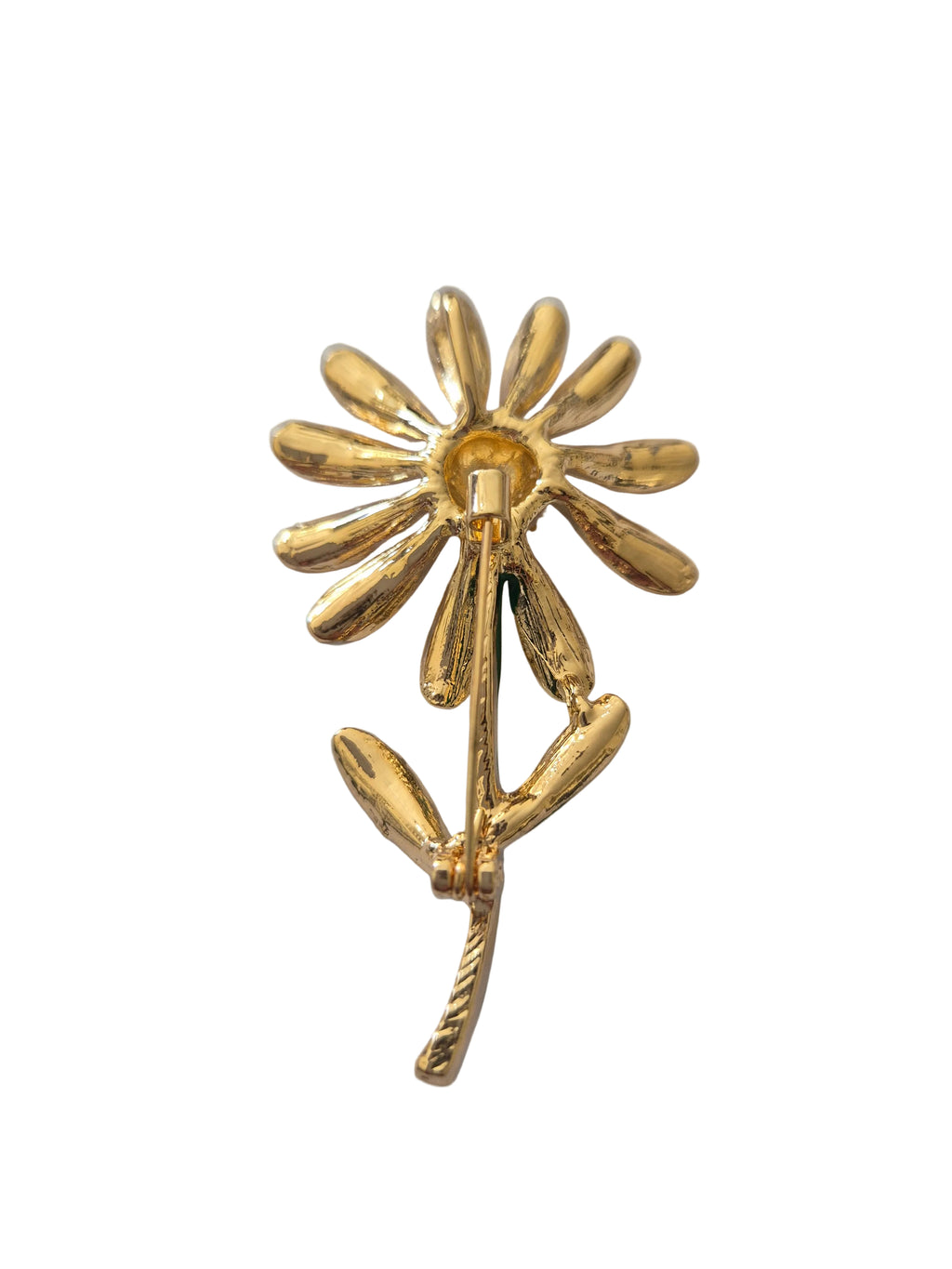 daisy flower-shaped brooch on a white background