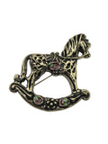 antique gold tone metal rocking horse brooch 