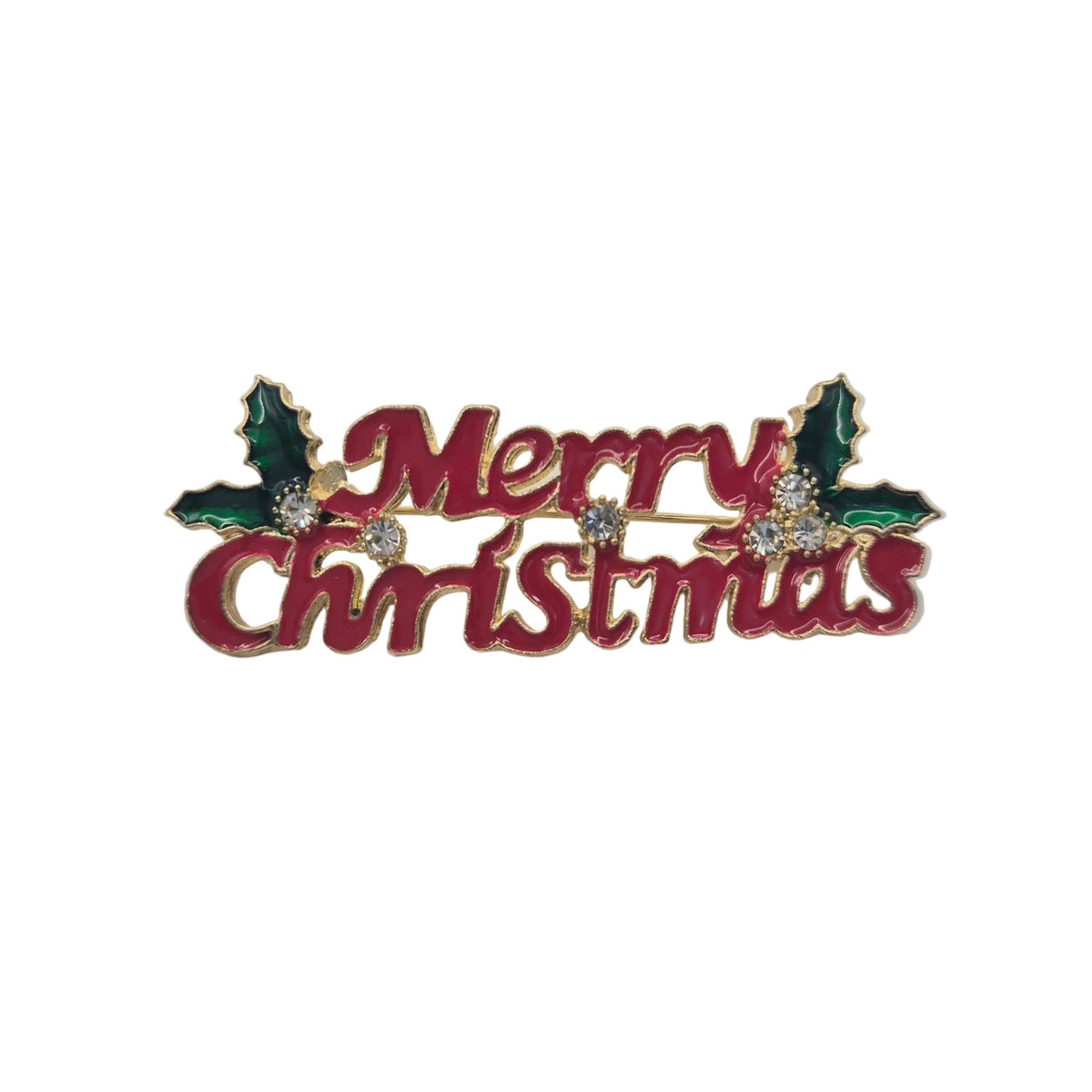 A 'Merry Christmas' enamel lapel pin with red lettering, green holly leaves, and small clear rhinestones on a plain white background.