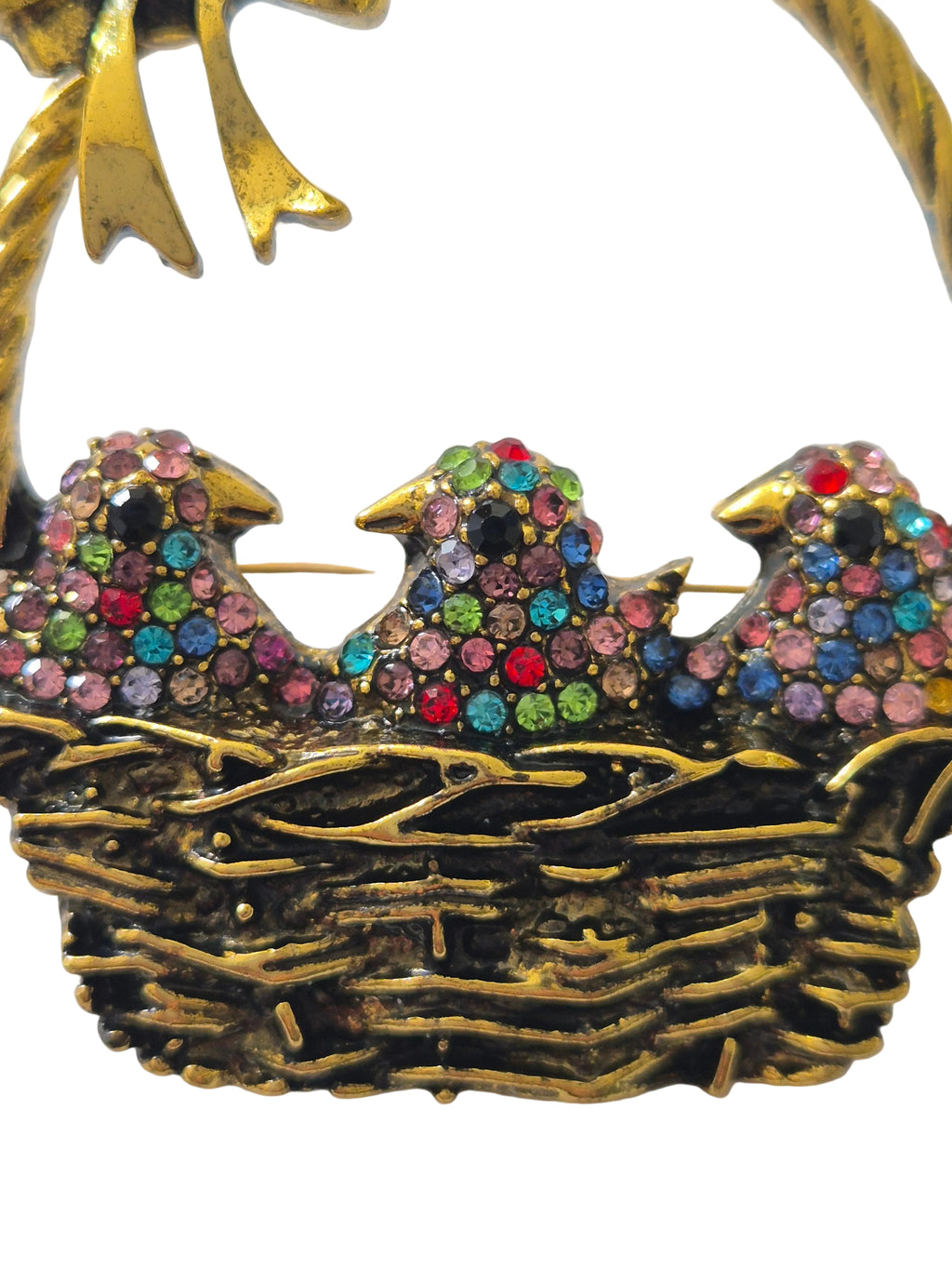 Decorative bird brooch with colorful gemstones 