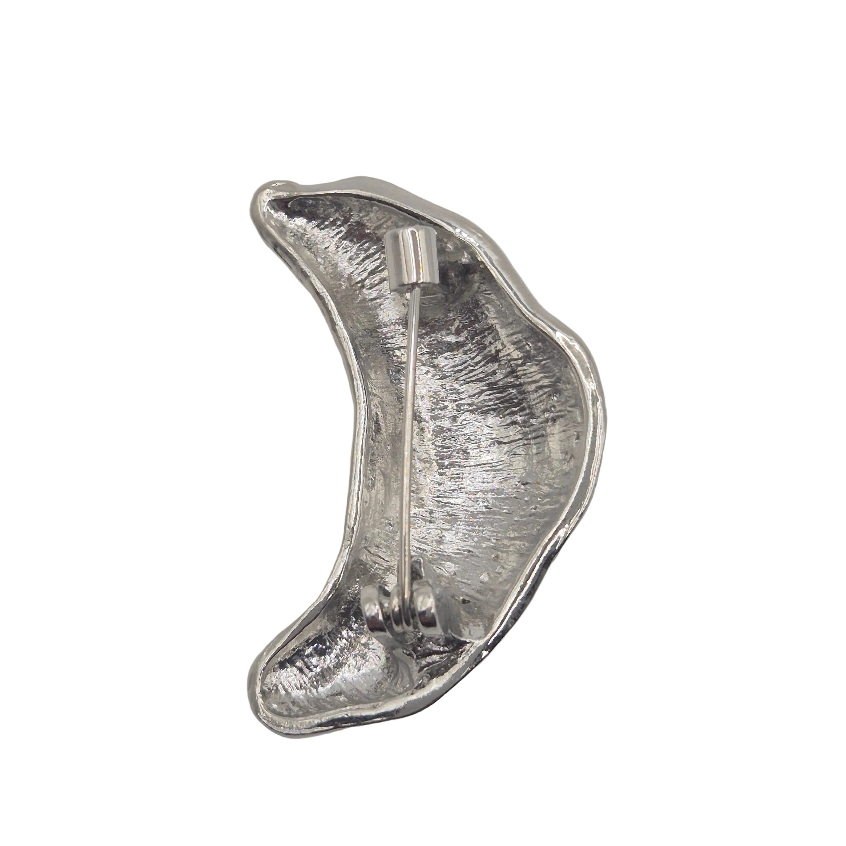 silver croissant brooch