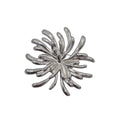 A silver metallic brooch shaped like a stylized firework burst, shown on a plain light gray background.