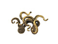 Bronze octopus brooch charm on a light gray background