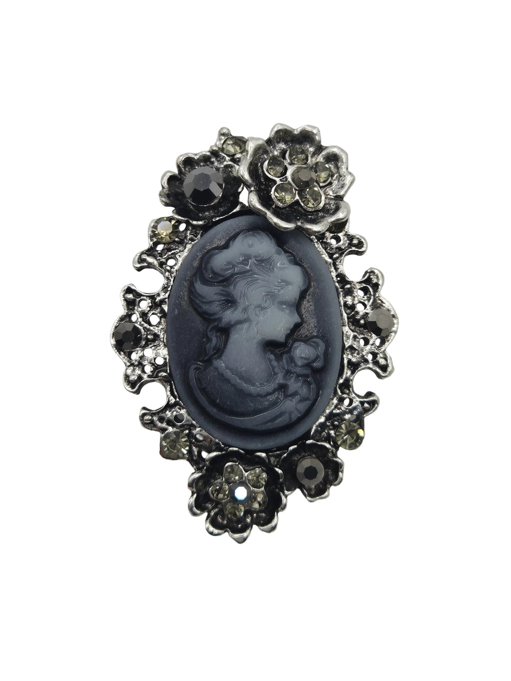 A vintage-style cameo brooch featuring a dark gray carved oval portrait in the center, surrounded by an ornate silver-tone floral border with small clear rhinestones, set against a plain white background.