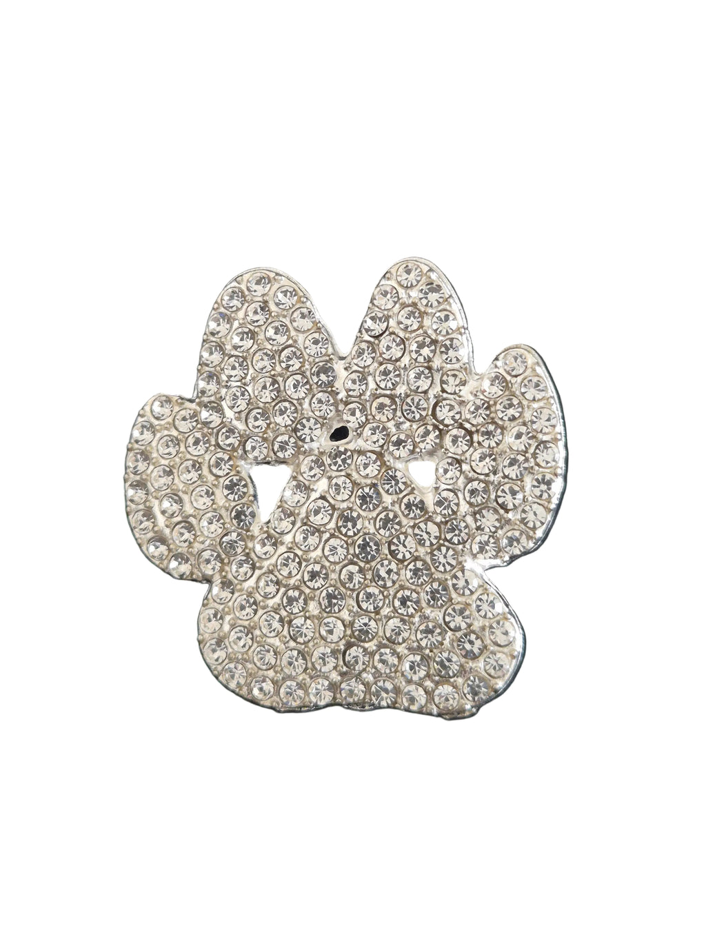 Decorative paw-shaped brooch with rhinestones on a white background