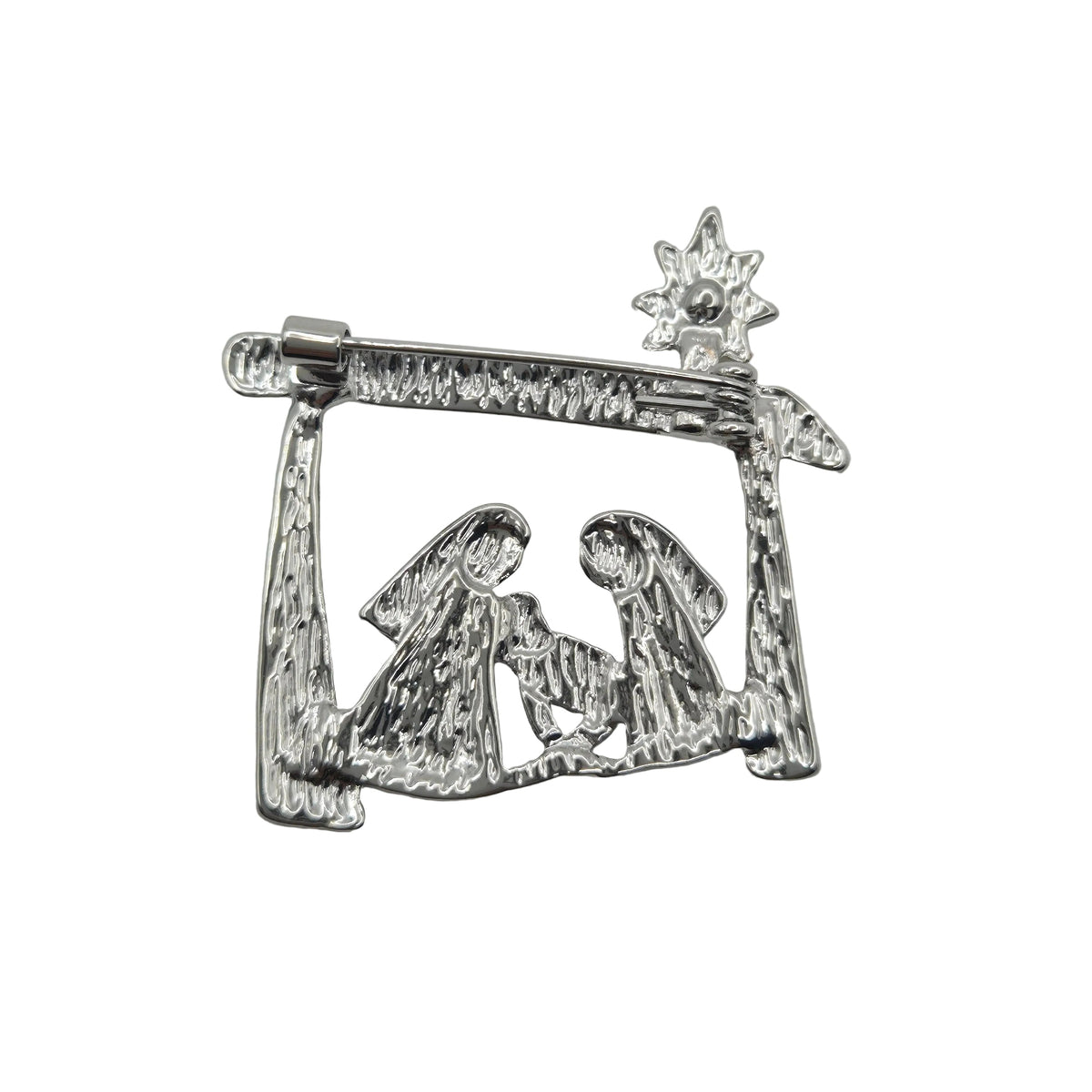 A silver-toned metal Christmas nativity scene ornament featuring Mary, Joseph, baby Jesus, and a star, displayed on a plain white background.