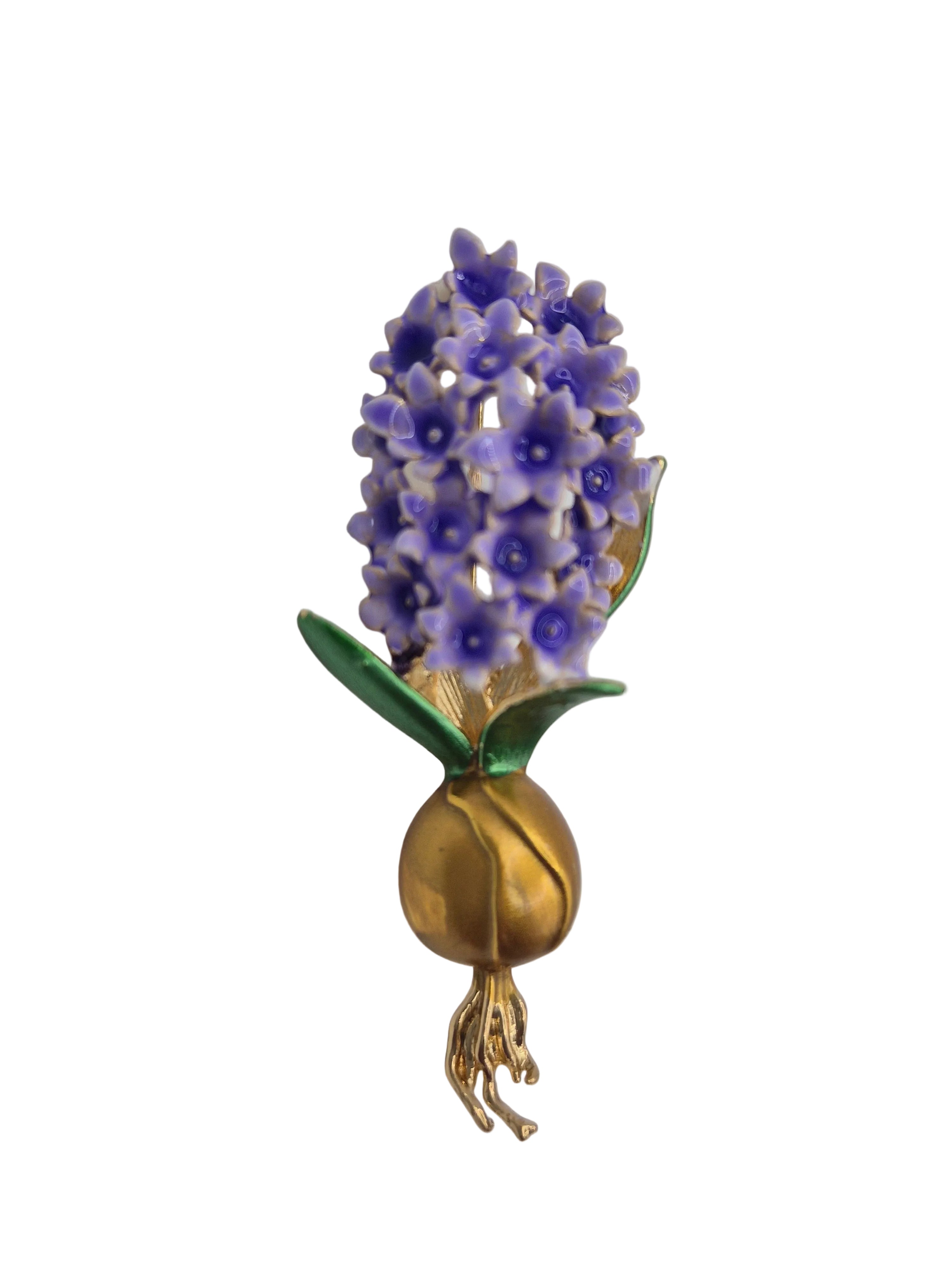 Purple Hyacinth Flower Brooch - gold and purple hyacinth brooch on grey background