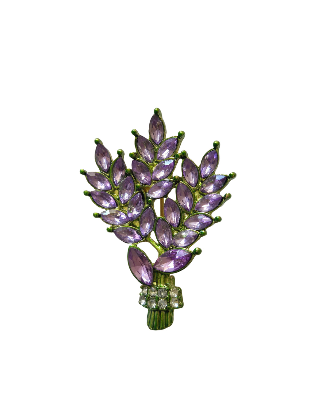 Purple  lavender gemstone brooch with green setting on a light gray background