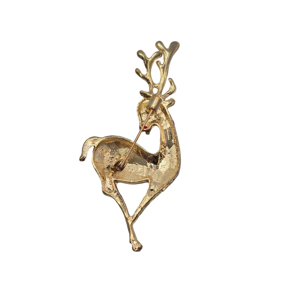 Reverse side of a festive reindeer brooch, shown against a plain white background.