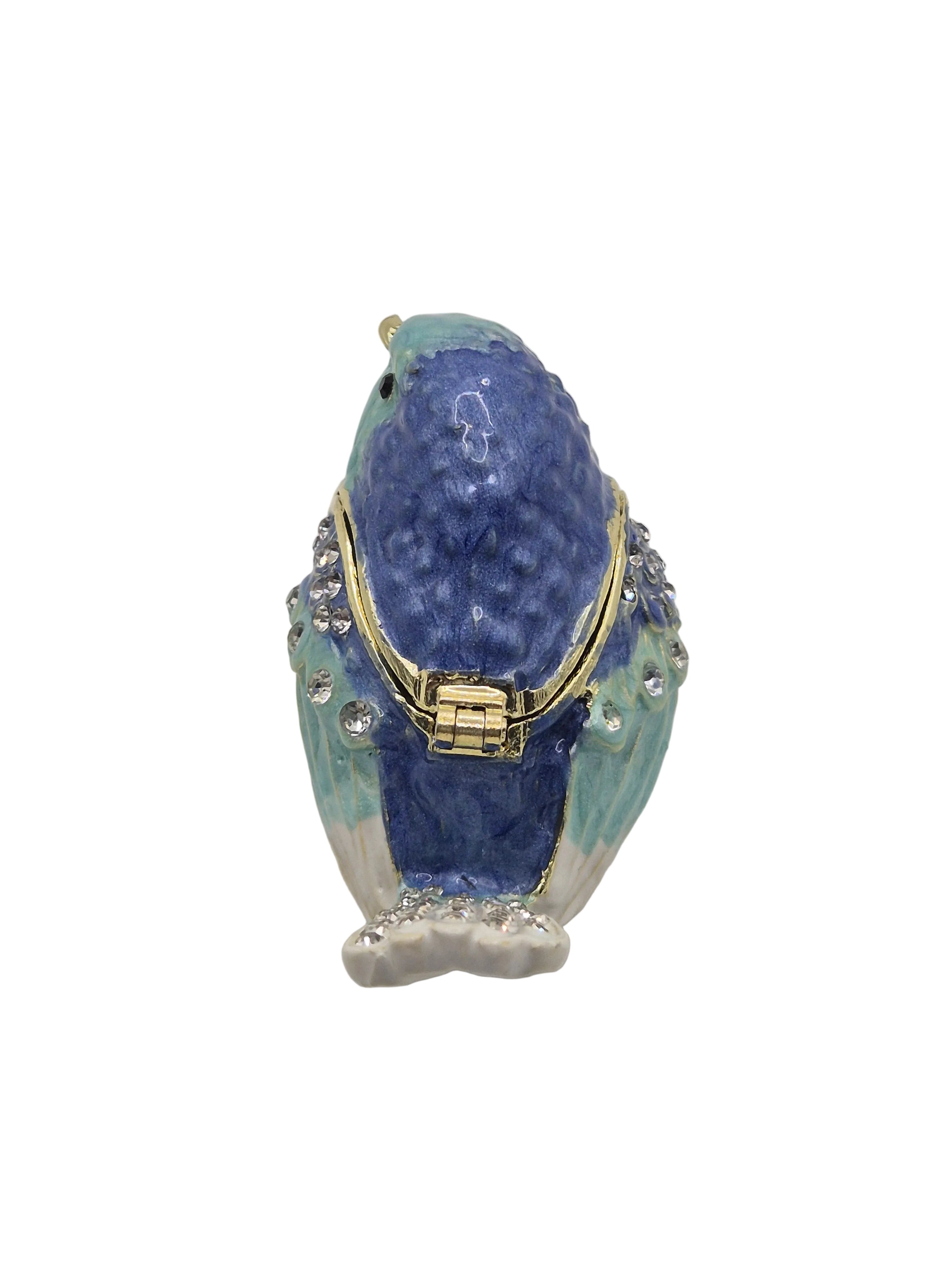 Blue bird trinket dish with gold accents  on white