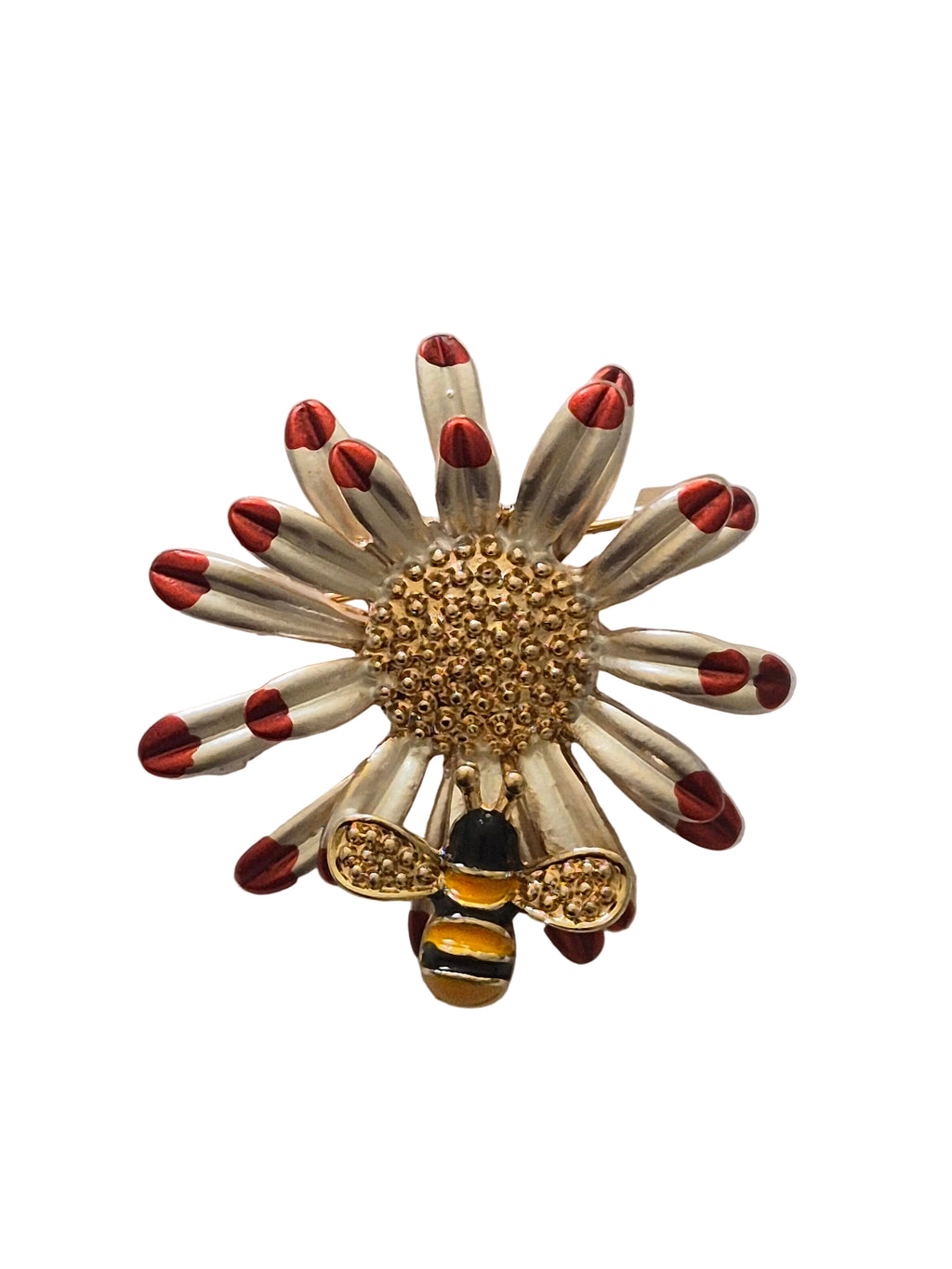 Gold daisy bee brooch with red accents on a white background