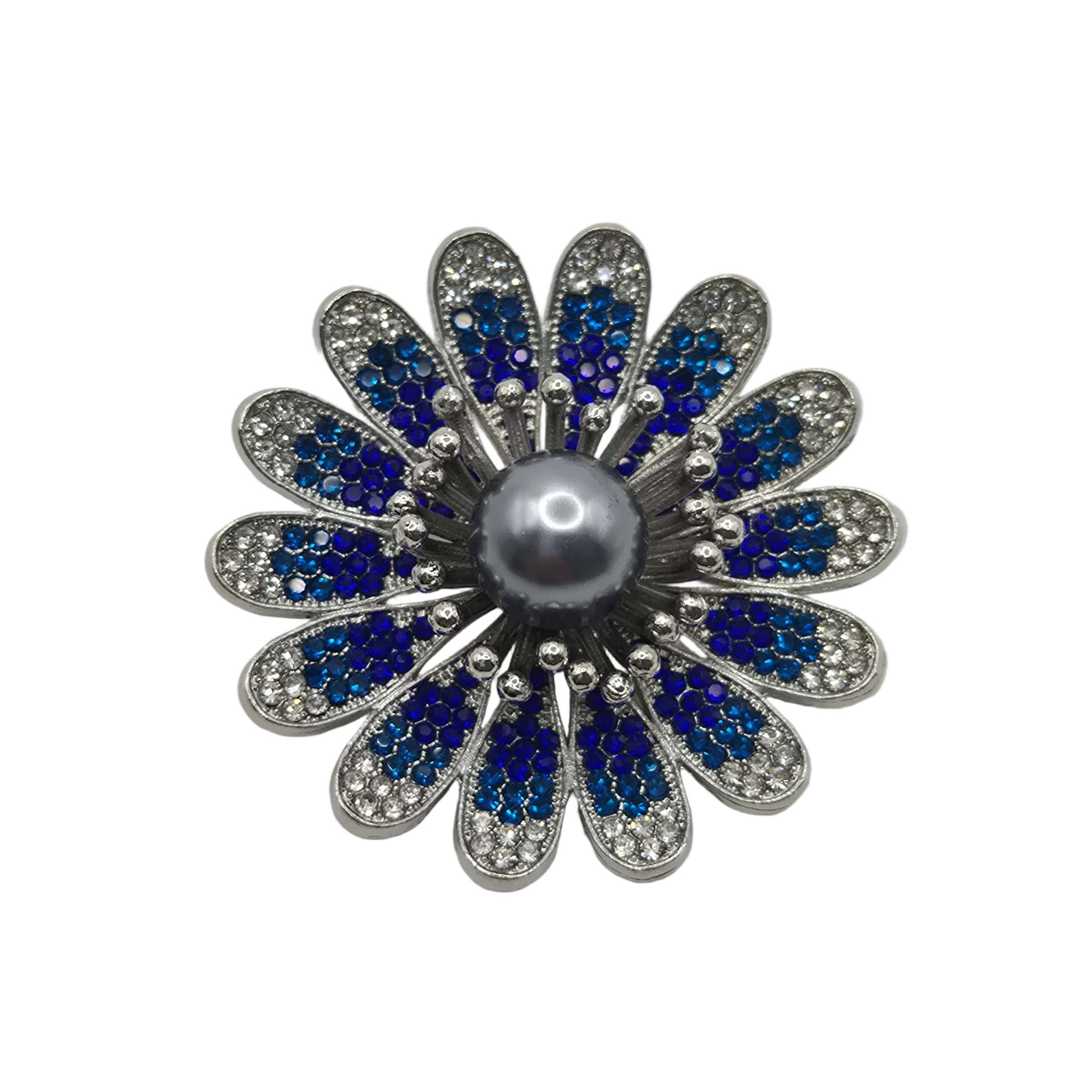 A flower-shaped brooch featuring a central gray pearl surrounded by silver-toned metal petals, with blue and clear rhinestones in each petal, set against a plain white background.