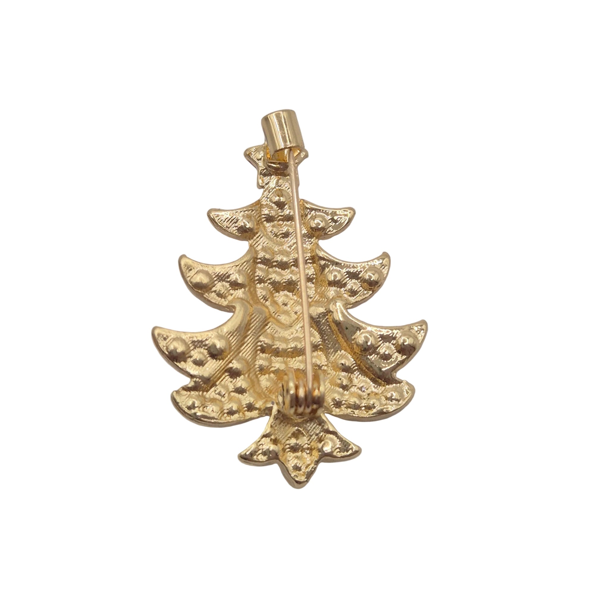 A gold Christmas tree-shaped brooch with a textured, beaded surface and a pin-back fastener at the top, shown on a plain white background.