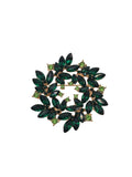 Green gemstone brooch on a gray background