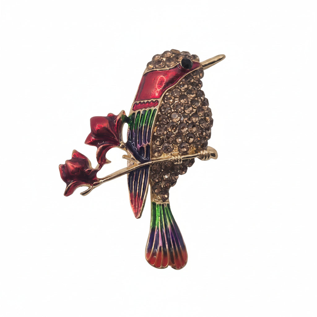 Colorful bird-shaped brooch on a white background