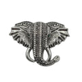 Large silver rhinestone elephant brooch statement pin on white background
