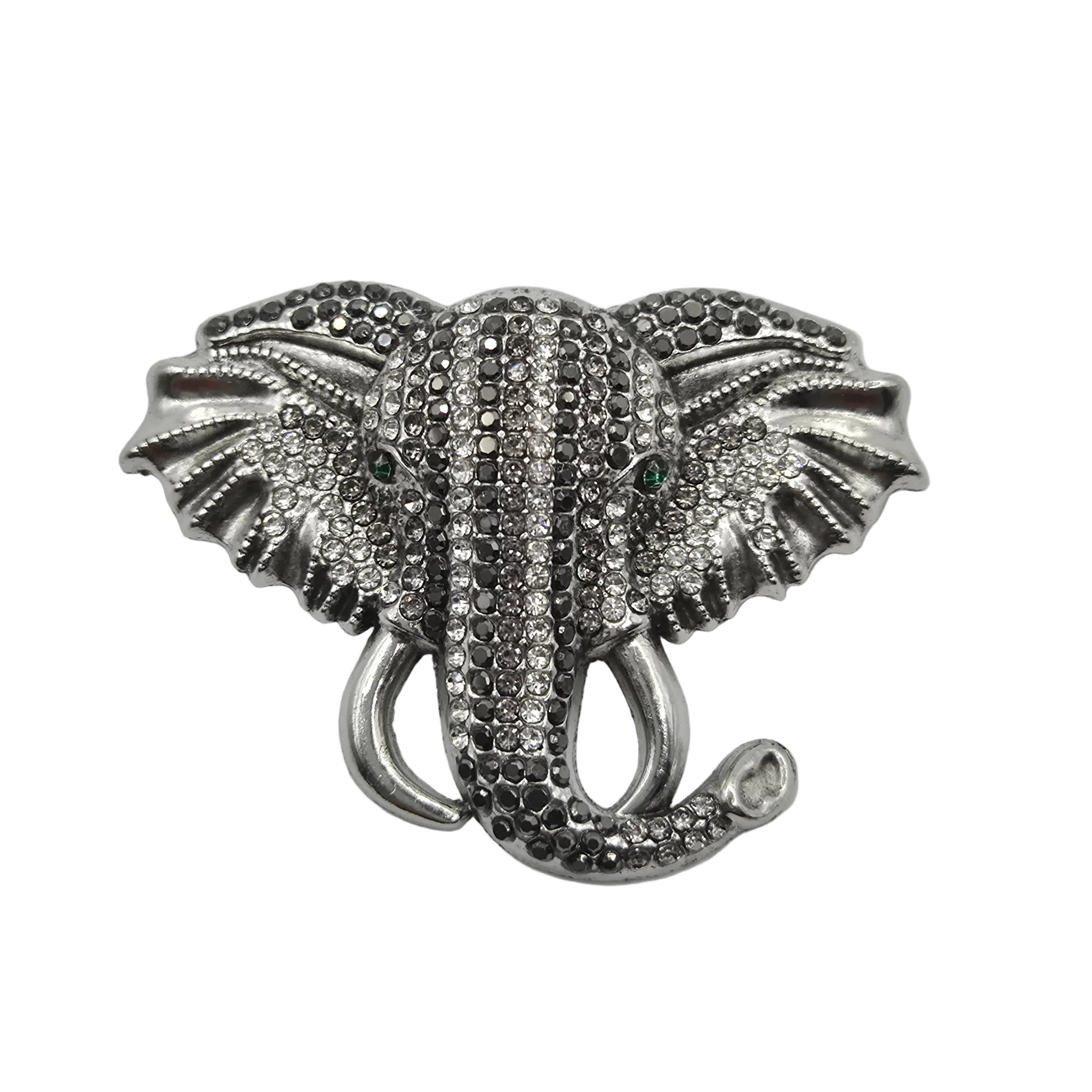 Large silver rhinestone elephant brooch statement pin on white background
