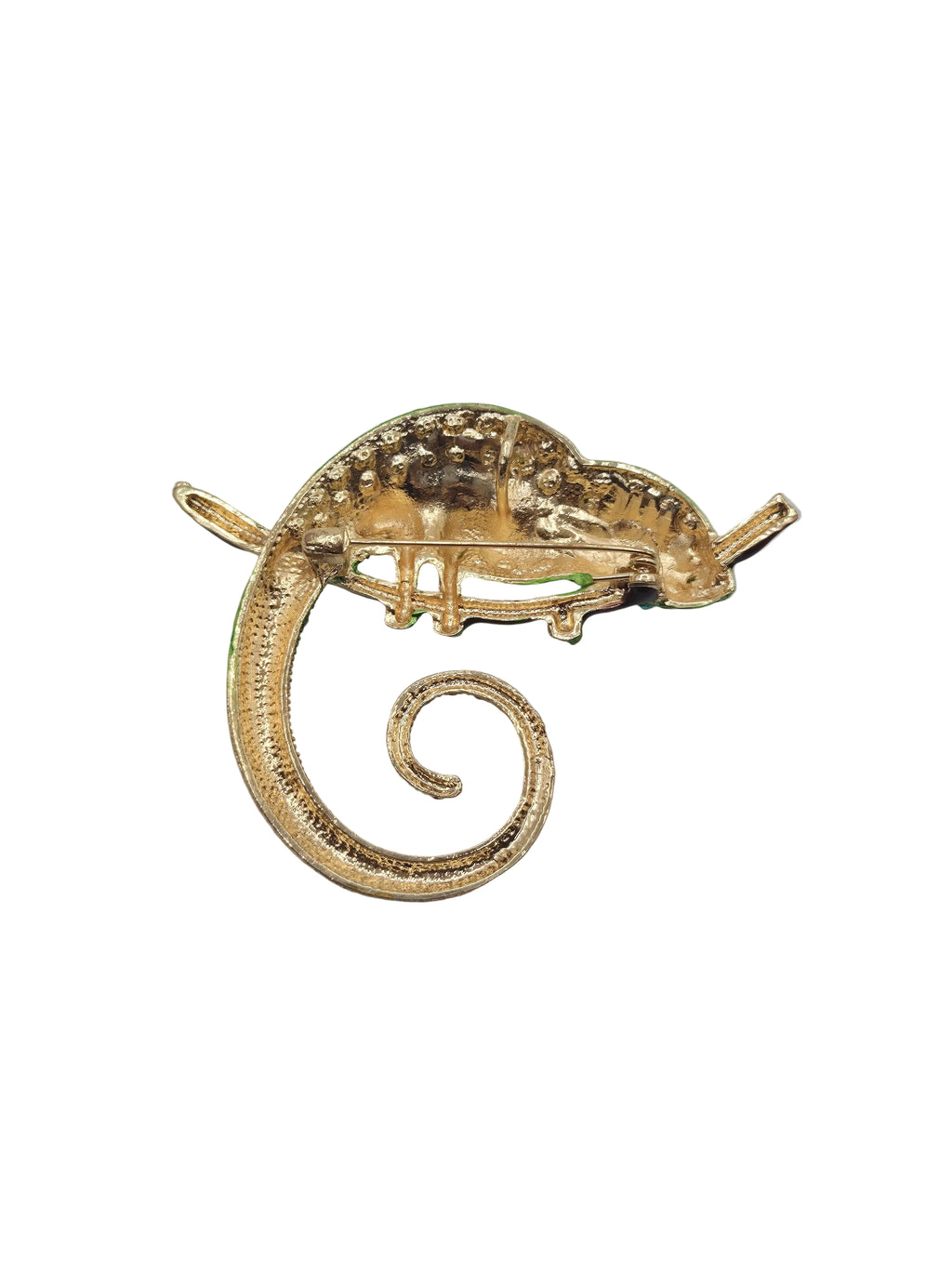A chameleon shaped brooch shown on reverse gold side on a plain white background.