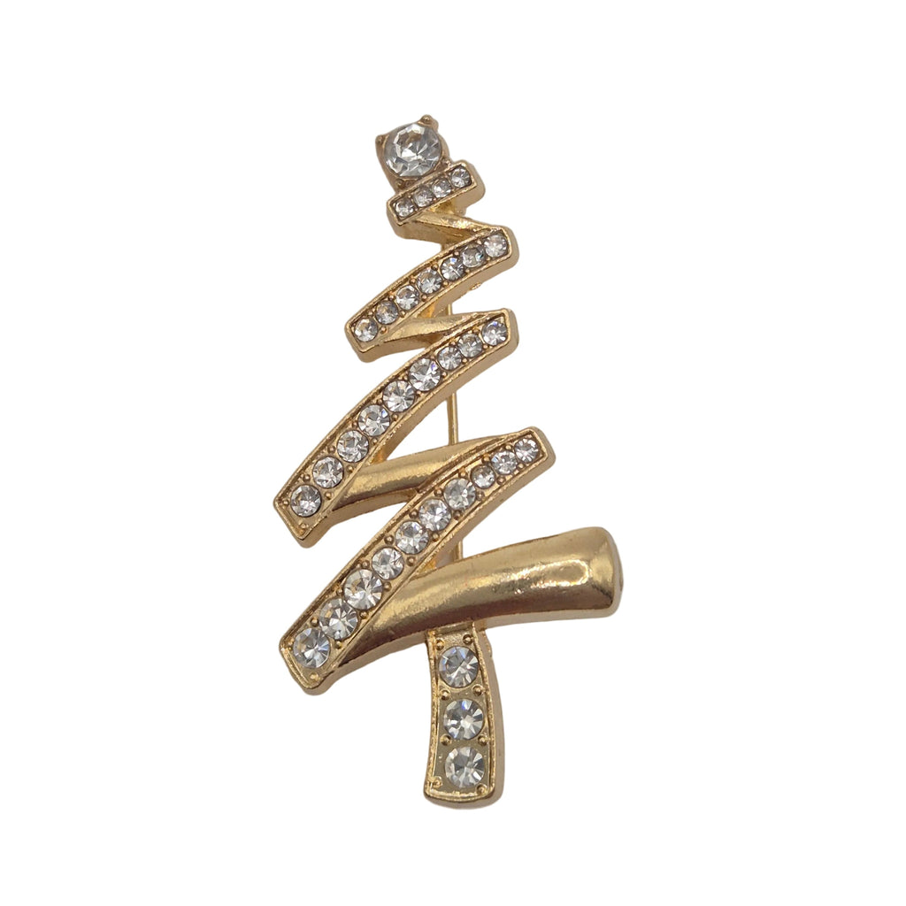 A gold Christmas tree-shaped brooch or pin embellished with clear rhinestones, shown on a plain white background.