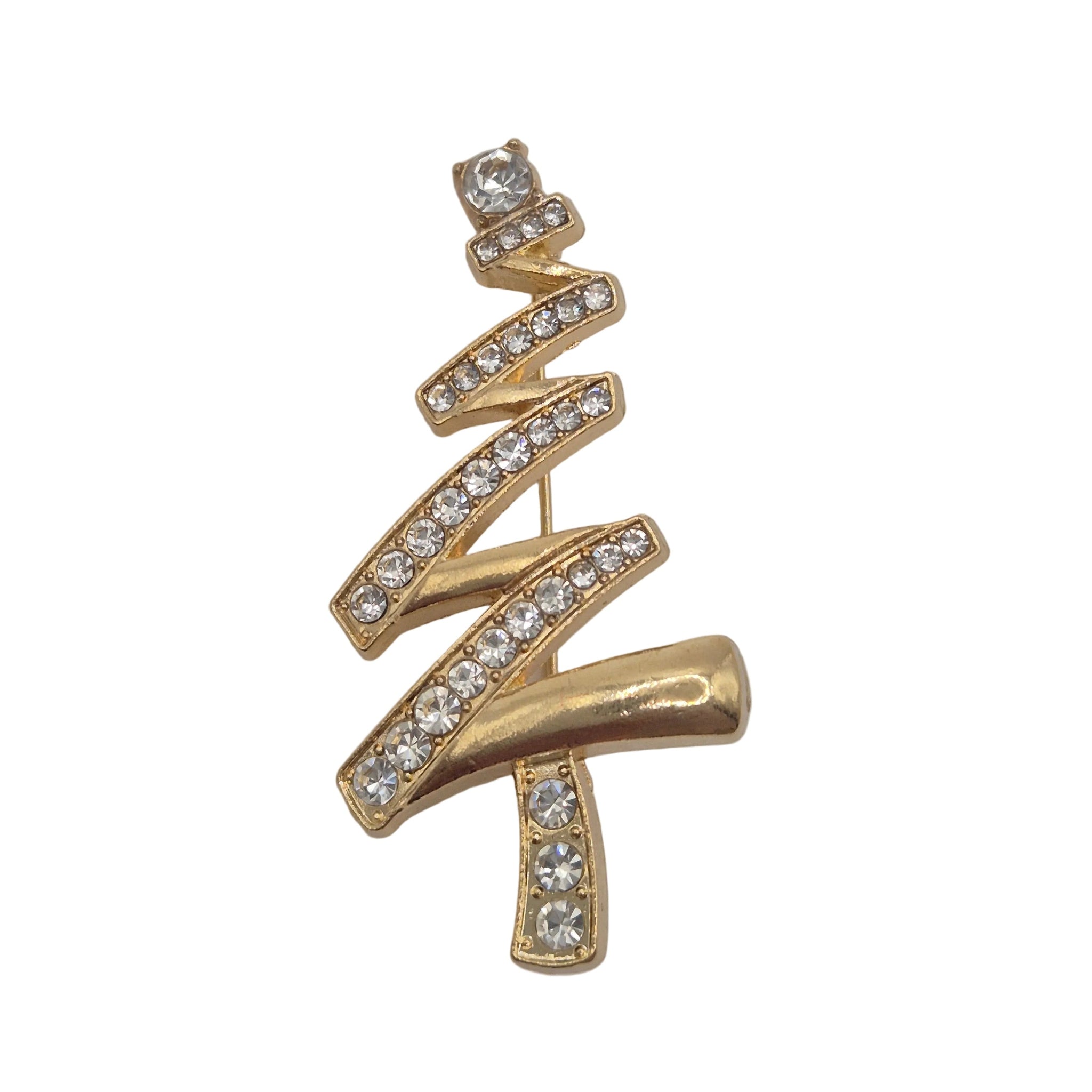 A gold Christmas tree-shaped brooch or pin embellished with clear rhinestones, shown on a plain white background.