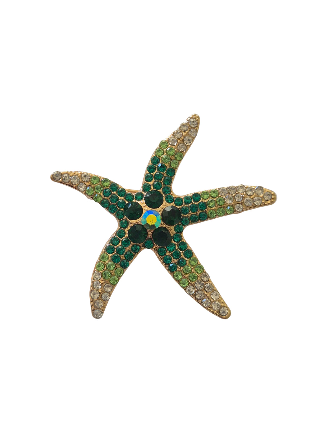 Starfish-shaped object with green and gold colors on a white background
