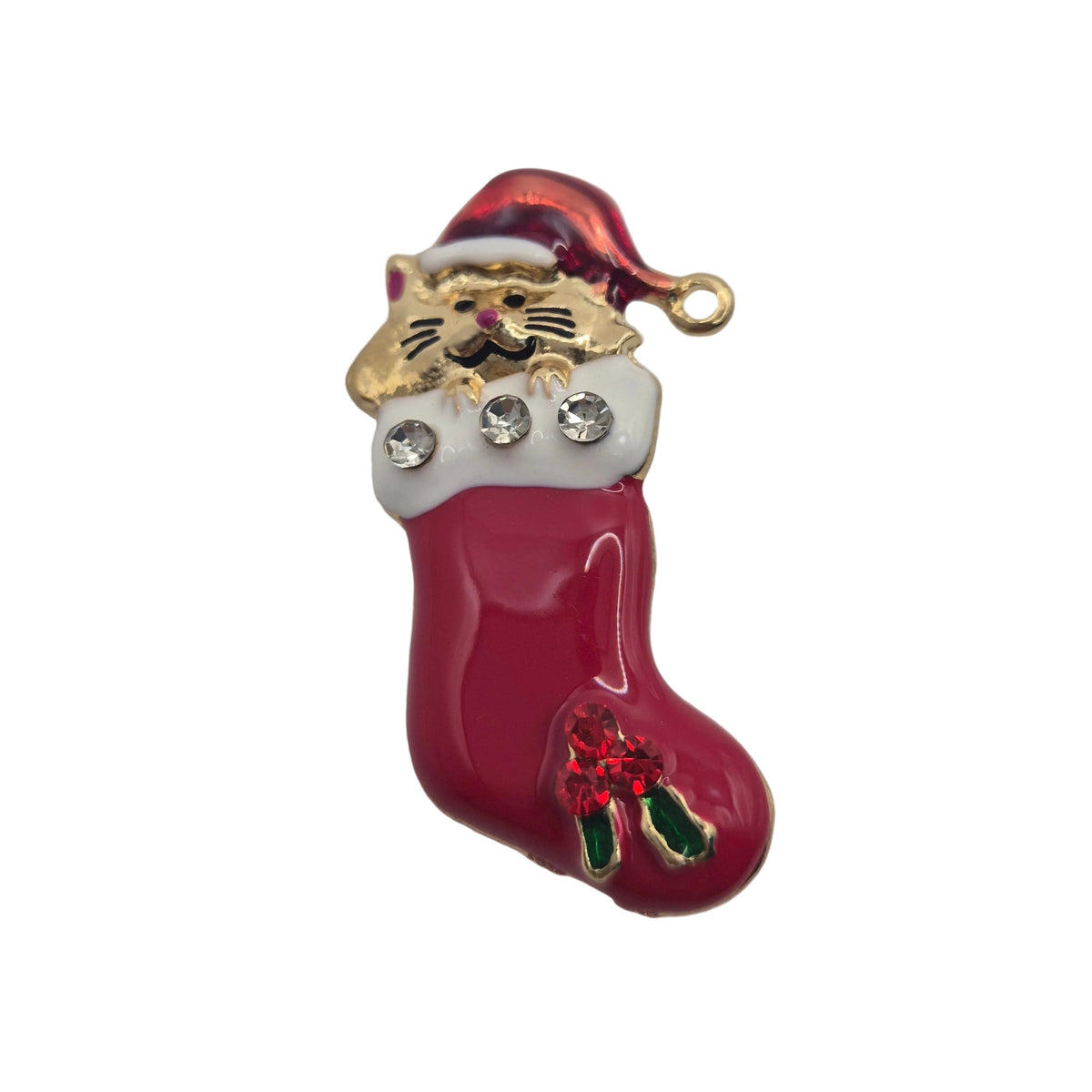 A Christmas stocking brooch featuring a gold cat wearing a red Santa hat, with three clear rhinestones on the white cuff and a red boot-shaped lower section decorated with green and red details, set against a plain white background.