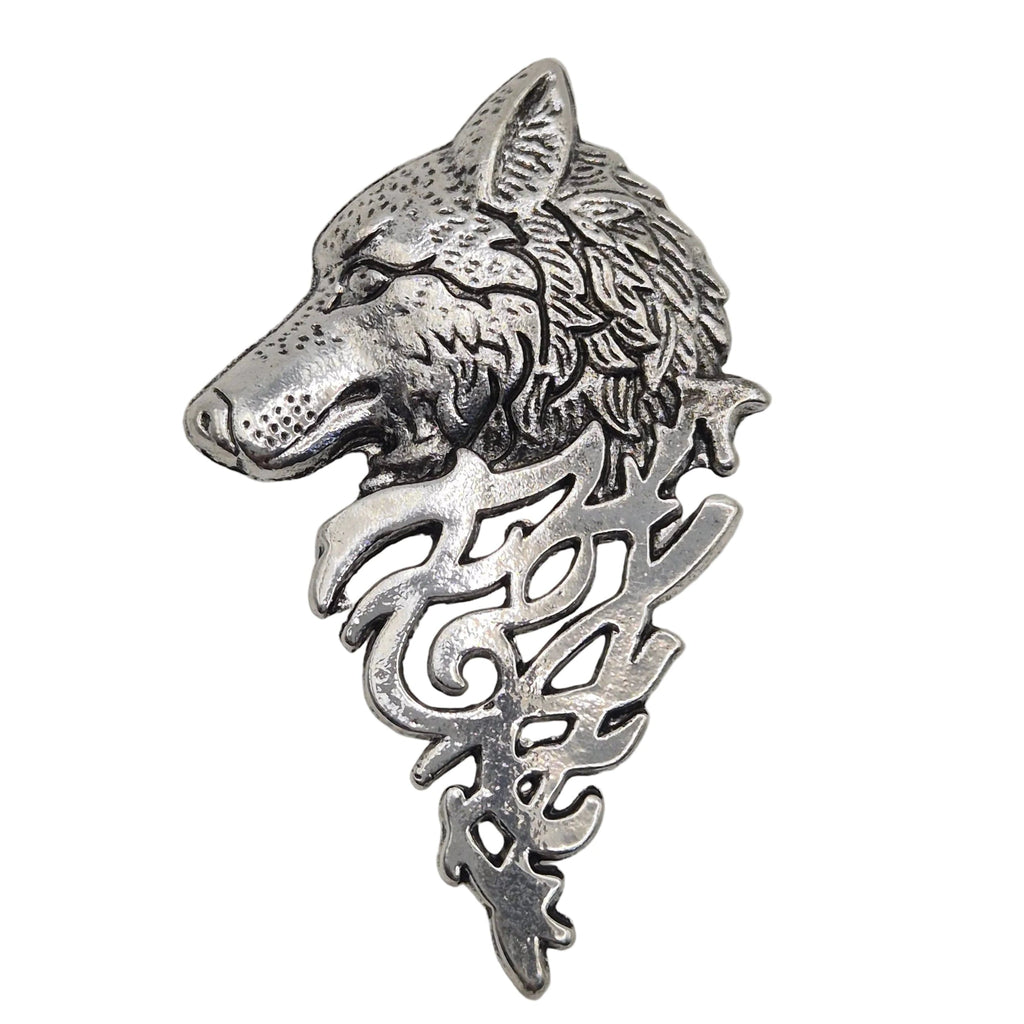 A silver-toned metal pin shaped like a wolf's head with ornate cutout details below, shown on a plain white background.
