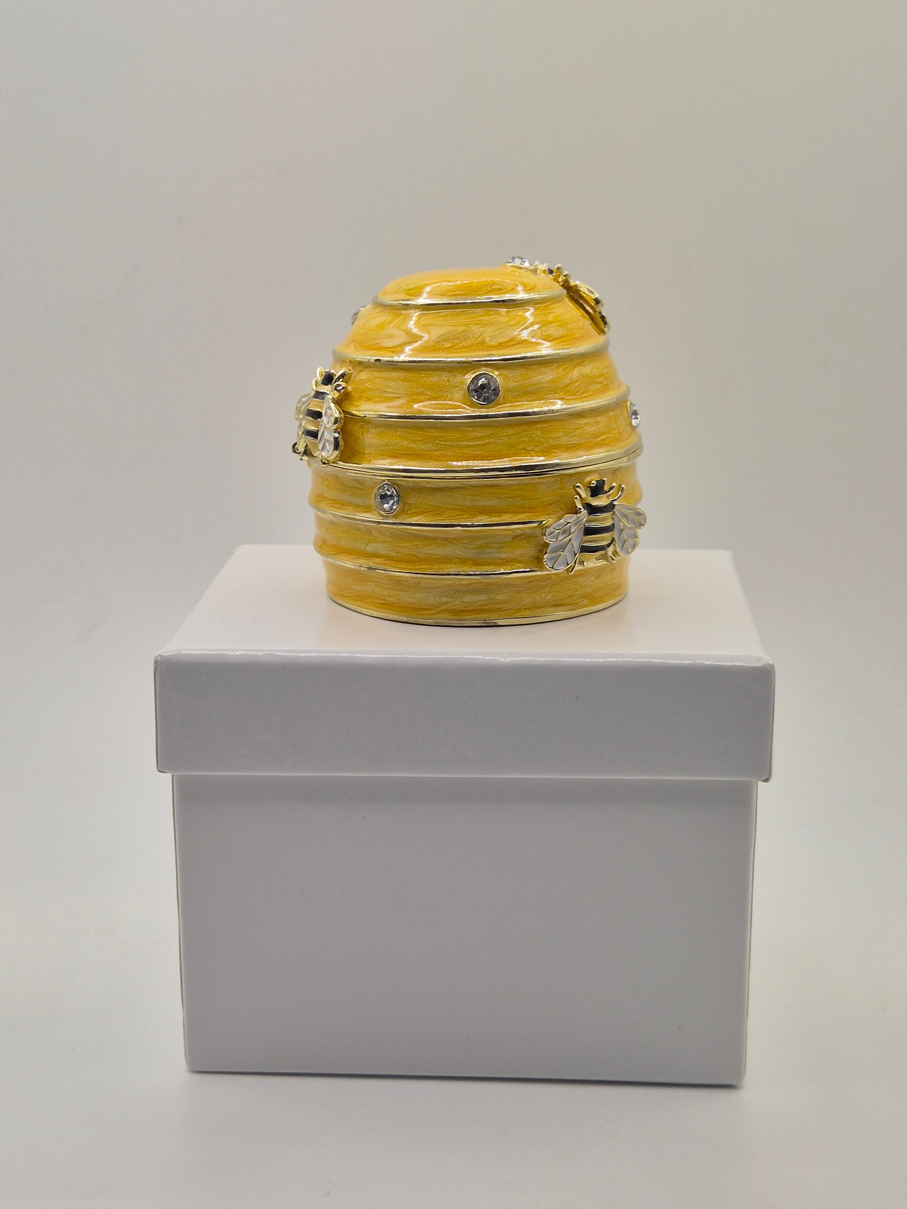 bee hive trinket pot on white background