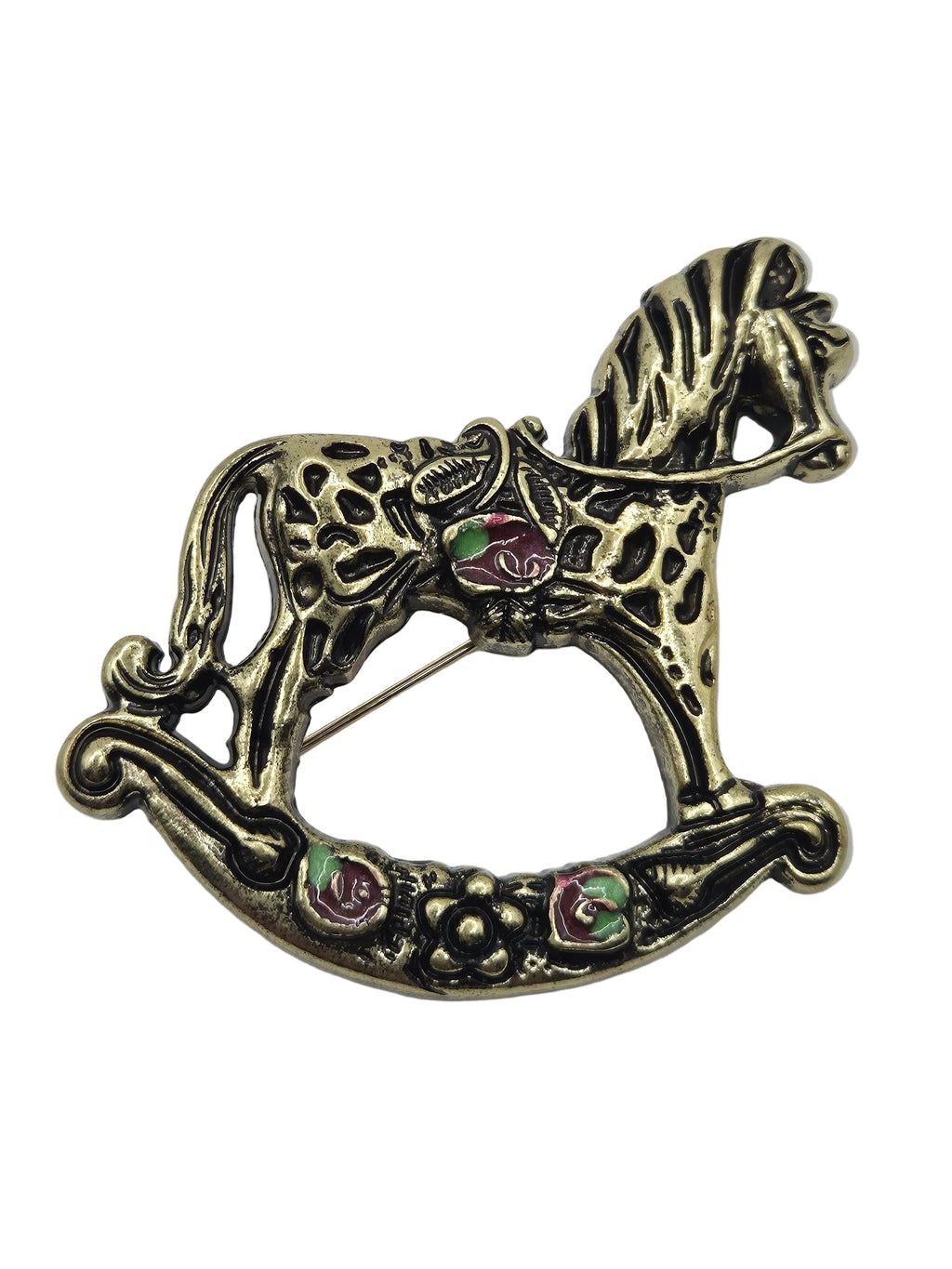 Antique gold tone rocking horse brooch with red green accents on a white background