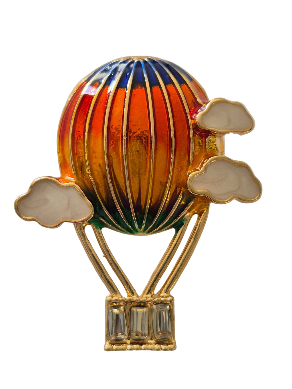 Colorful hot air balloon brooch with gold accents on a white background