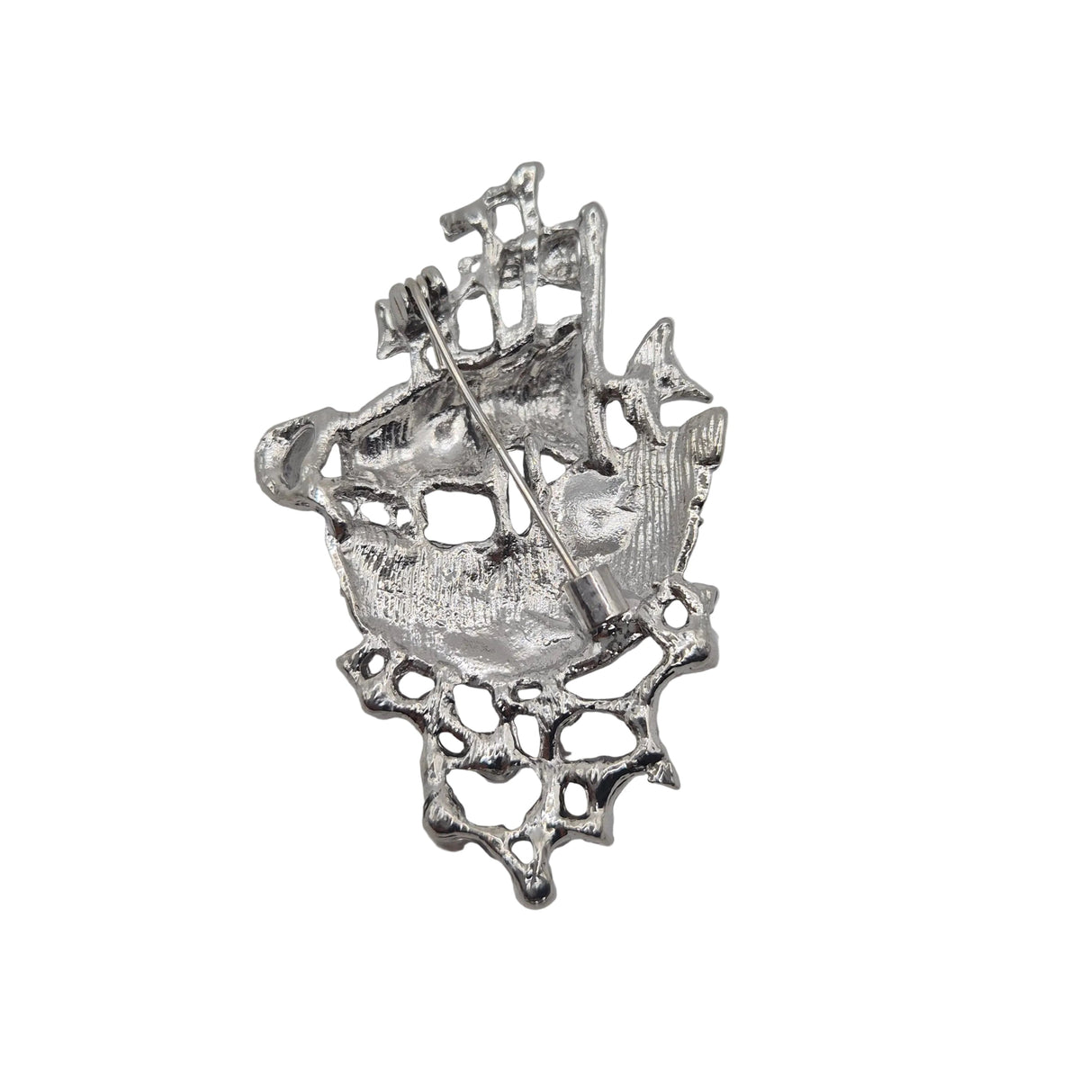 A silver-toned pirate ship brooch with a textured, weathered finish and an attached pin, shown against a plain white background.