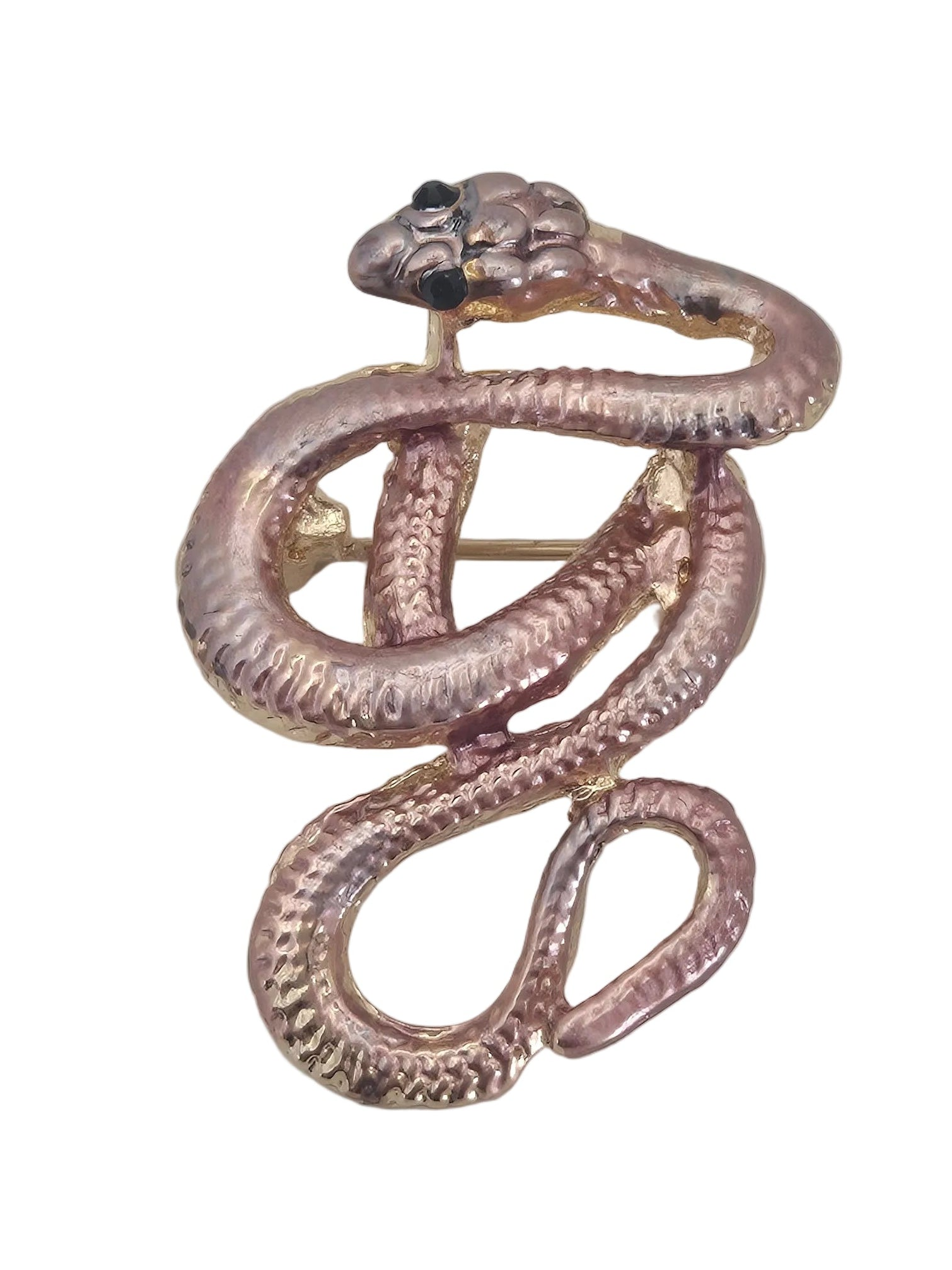A coiled snake brooch with a textured metallic finish in rose gold and gold tones, featuring small black eyes, set against a plain white background.