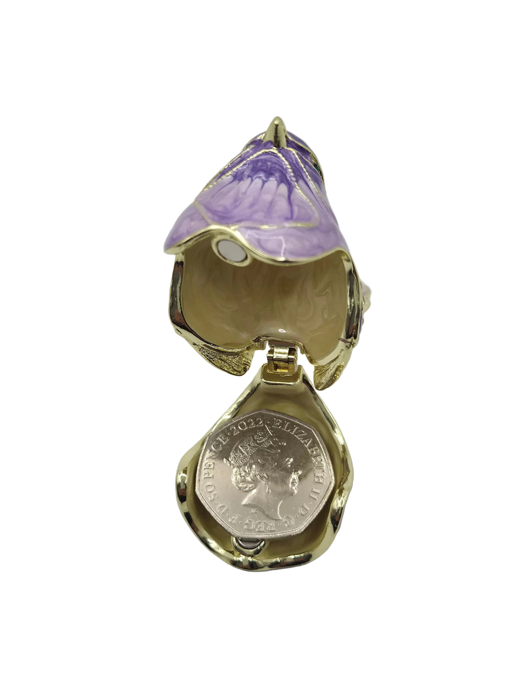 Gold and purple decorative trinket pot on a gray background