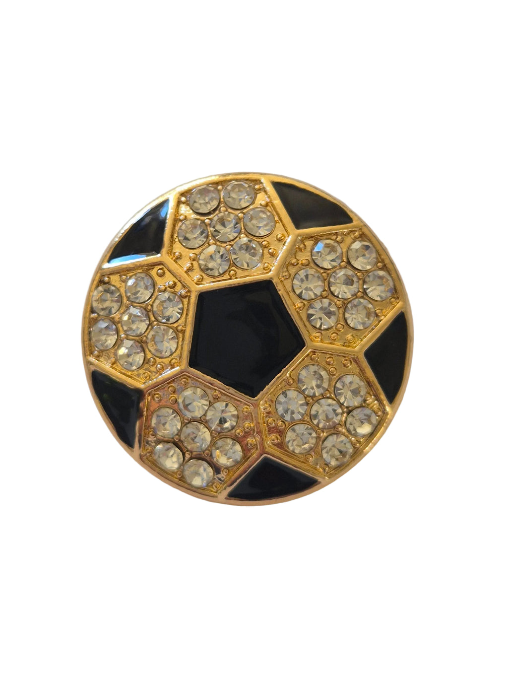 Rhinestone football brooch with gold and black detail on a white background